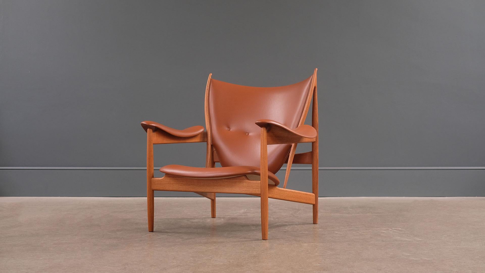 Legendary Chieftain chair designed by Finn Juhl. This example in wonderful solid teak (no longer in production) and made by One Collection. Approximately 5 years old. Fantastic and rare opportunity to acquire this amazing armchair.