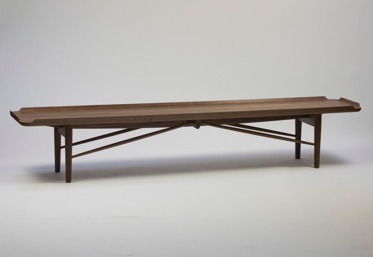 Bench designed by Finn Juhl in 1951, relaunched in 2018.
Manufactured by House of Finn Juhl in Denmark.

In 1951, Finn Juhl designed the bench for Baker Furniture in USA, who named it 