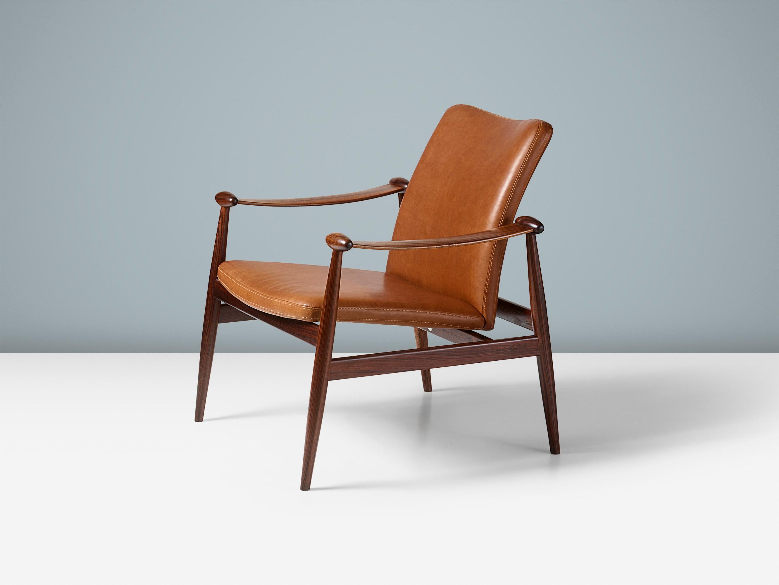 Finn Juhl - Spade Chair, 1954

Designed in 1954 the Model 133 ‘Spadestolen’ was Juhl's first collaboration with Danish producer France & Son. The frame was originally made in teak with loose foam cushions, sprung back and ‘knock-down’ construction