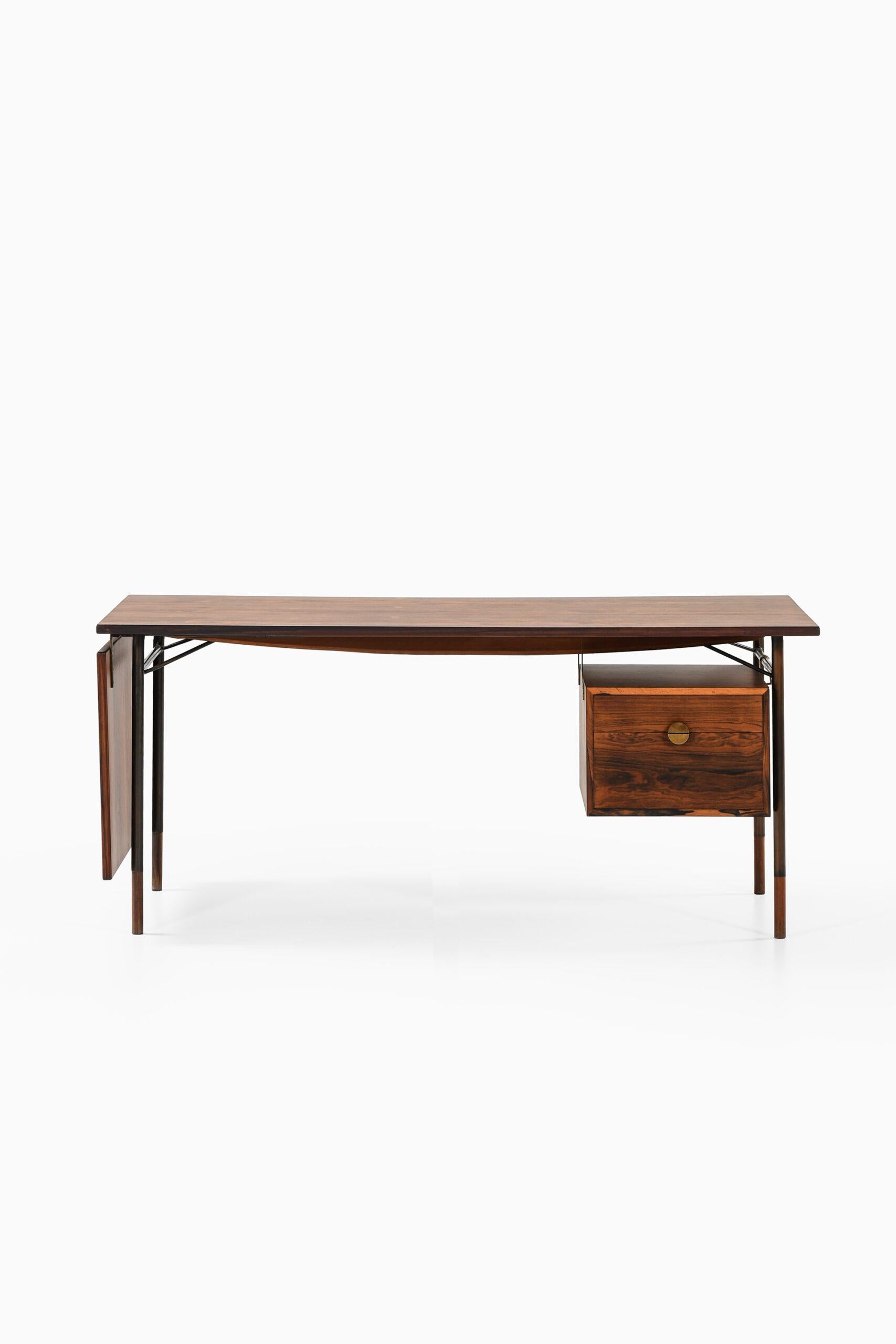 Rare freestanding desk model BO-69 designed by Finn Juhl. Produced by Bovirke in Denmark. Dimensions (W x D x H): 170 ( 223 ) x 85 x 73 cm.
