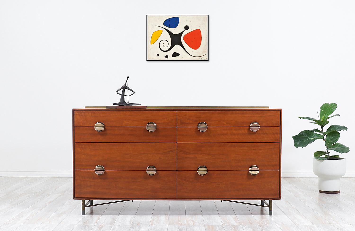 Finn Juhl dresser with brass accents for Baker Furniture.