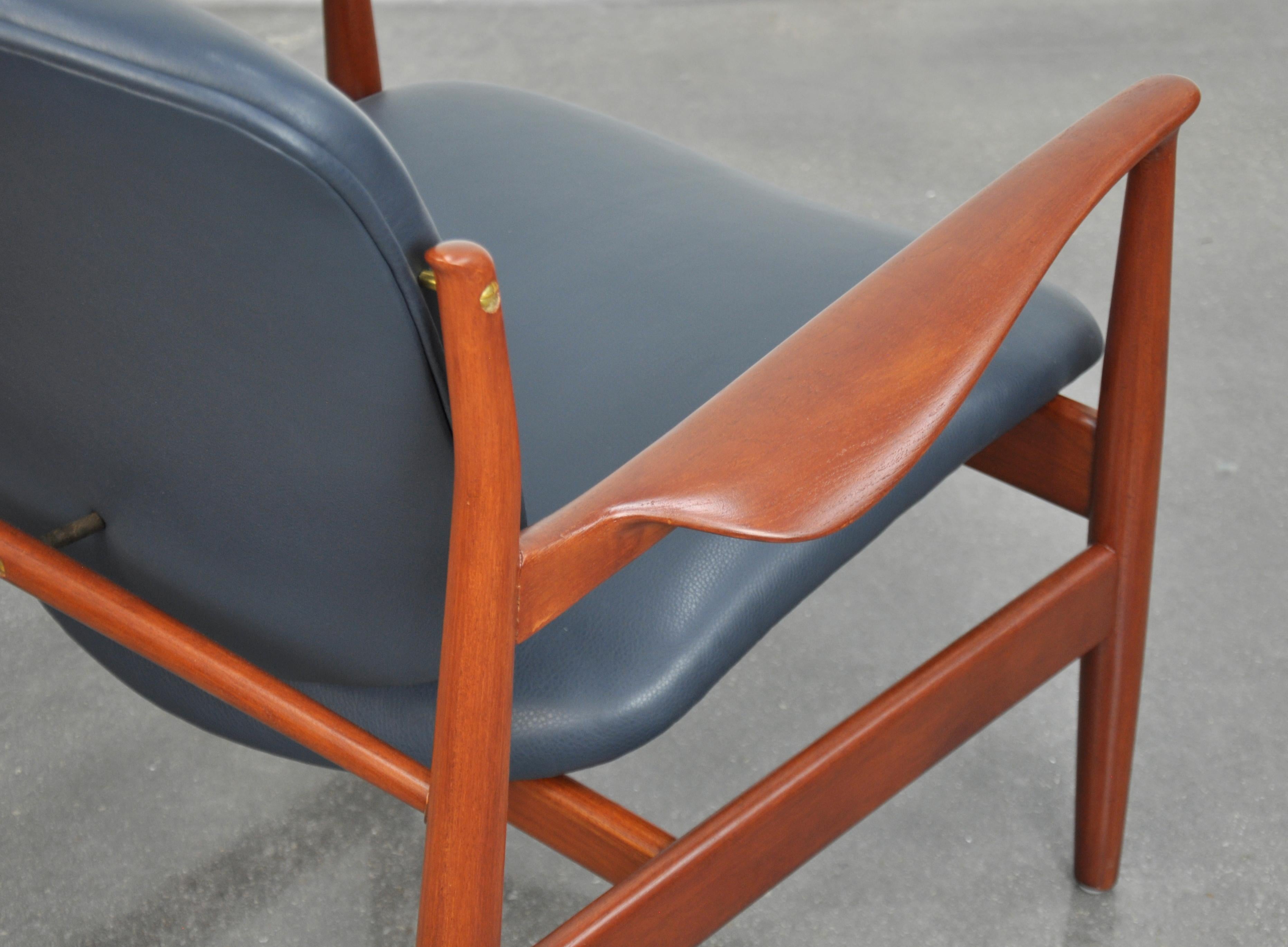Finn Juhl FD 136 Teak and Navy Blue Leather Lounge Chair 1