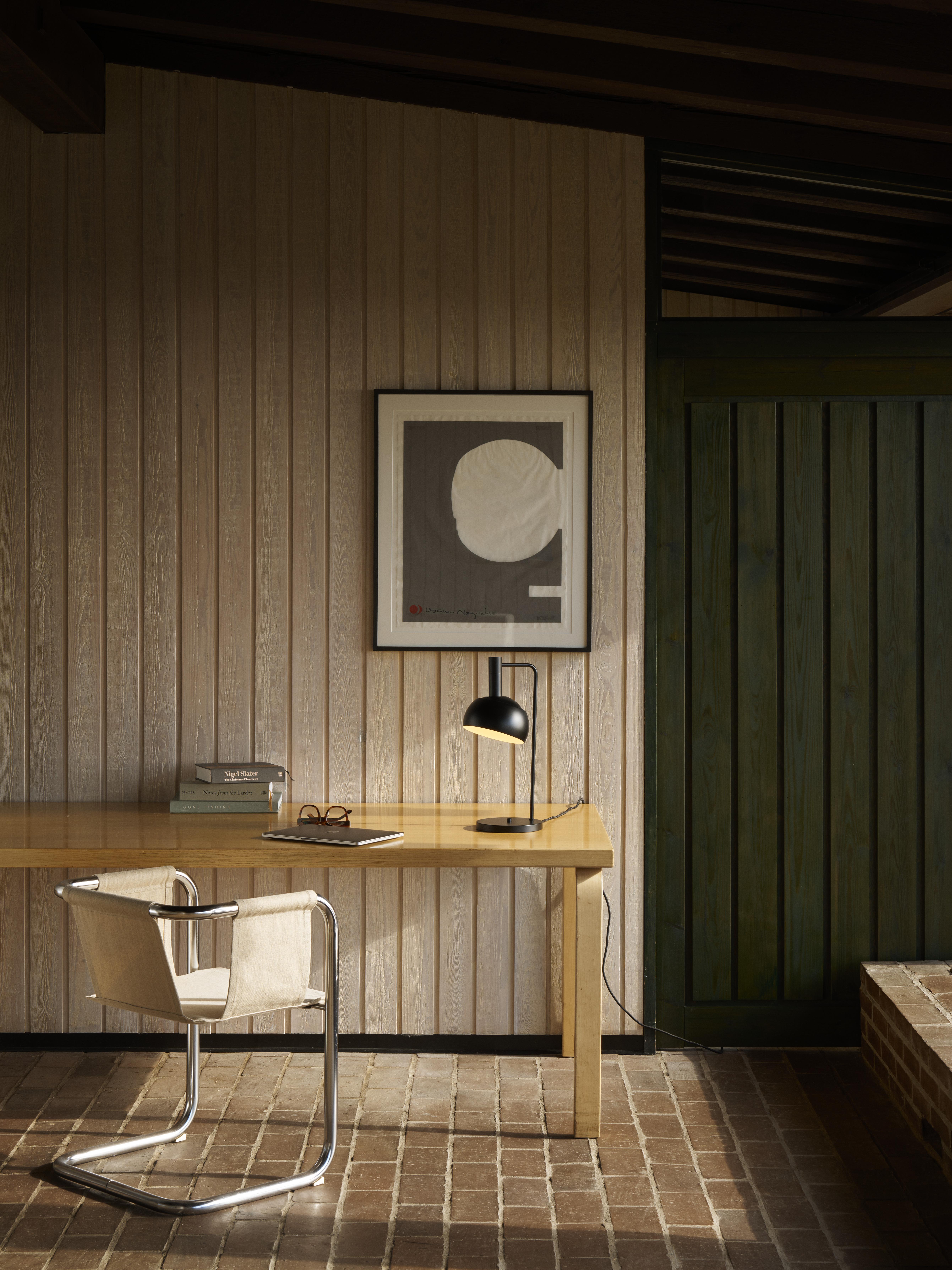 Finn Juhl 'FJ Elements' Table Lamp in Black for Louis Poulsen

This lamp design is one of the few ever created by Finn Juhl (1912-1989), one of Denmark's most renowned architects. Initially designed in 1963, the pendant and table lamp were