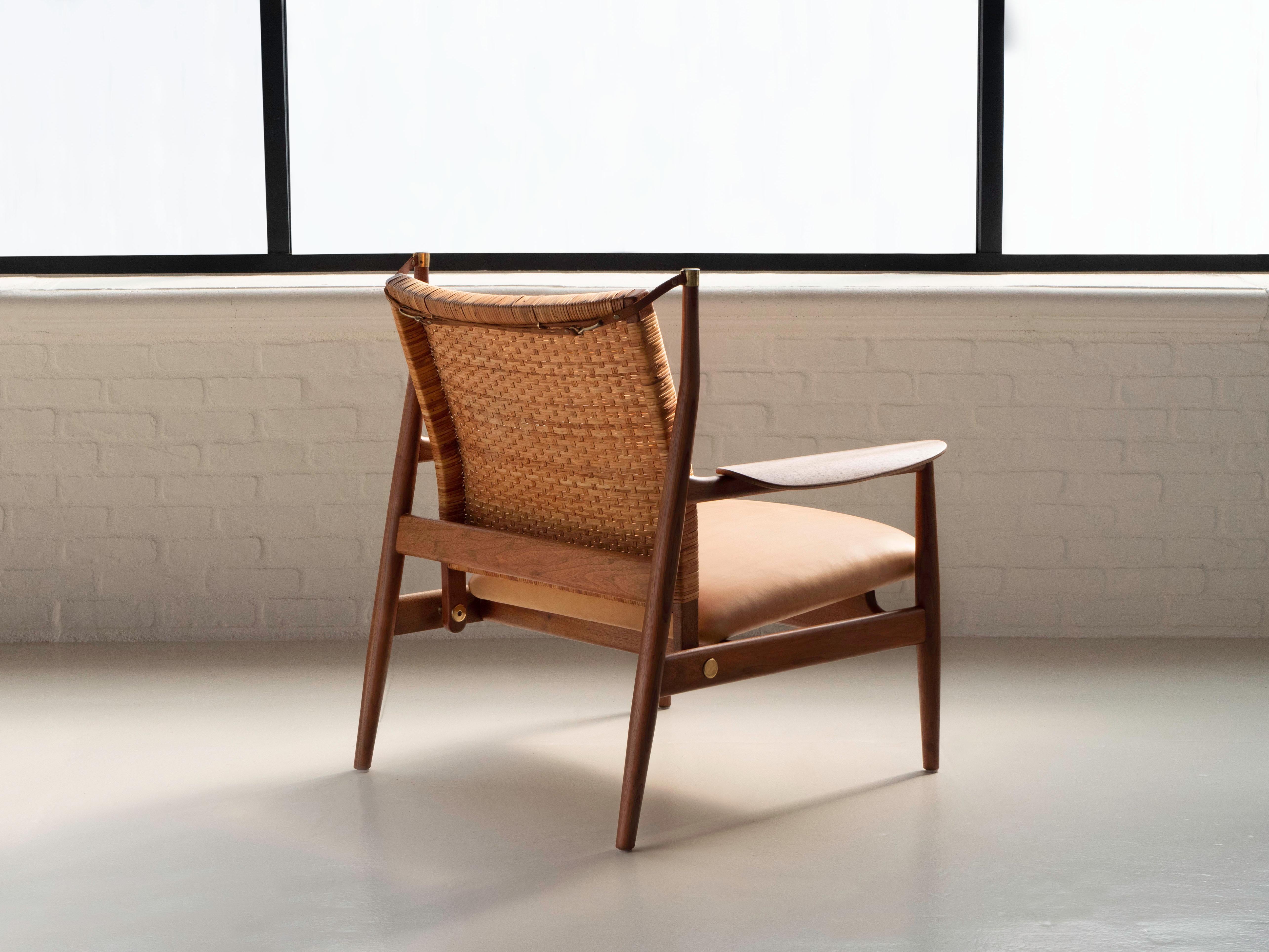 American Finn Juhl FJ55 Cane Back Reclining Chair in Walnut for Baker Furniture, 1950's For Sale