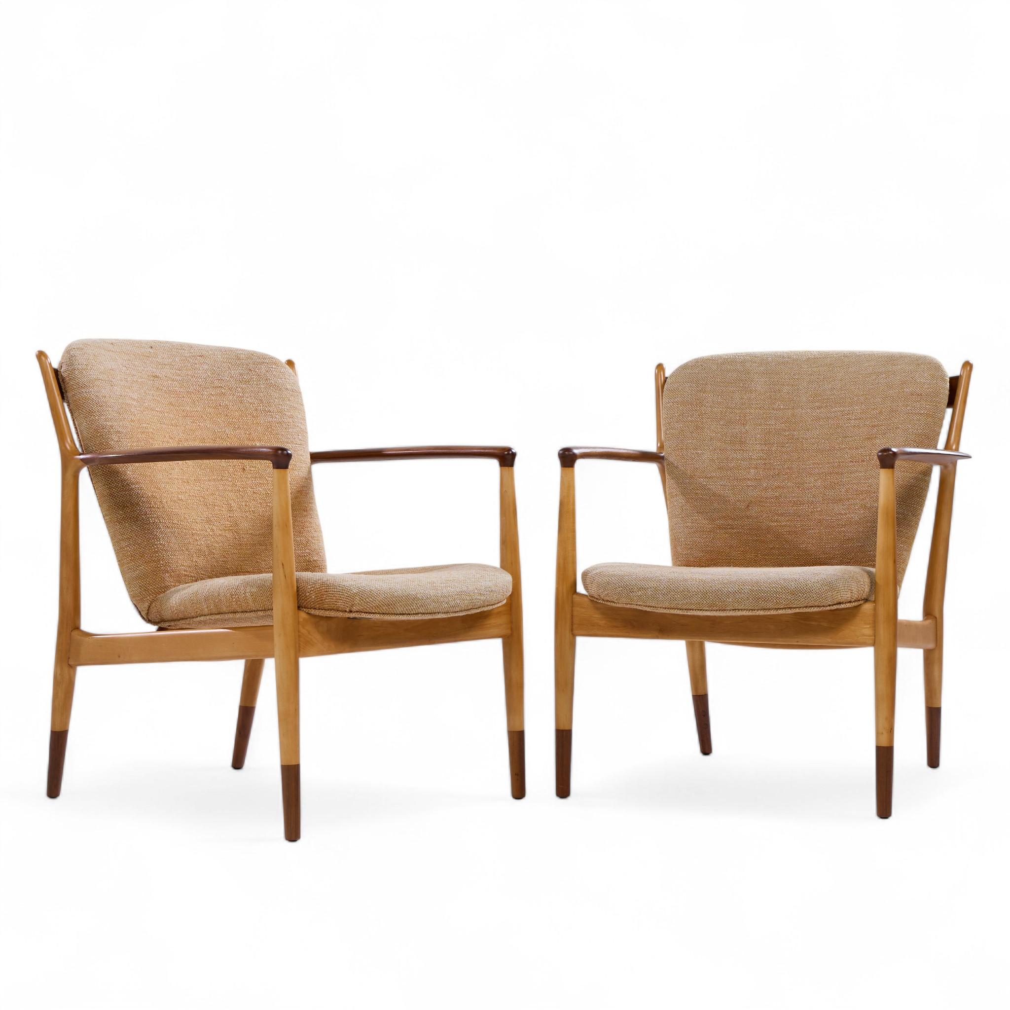 Finn Juhl for Baker Delegate Mid Century Walnut Lounge Chairs - Pair

Each chair measures: 29.5 wide x 30 deep x 32.75 high, with a seat height of 16.5 and arm height/chair clearance of 22 inches

Restored - Chair Frames have Been Restored.