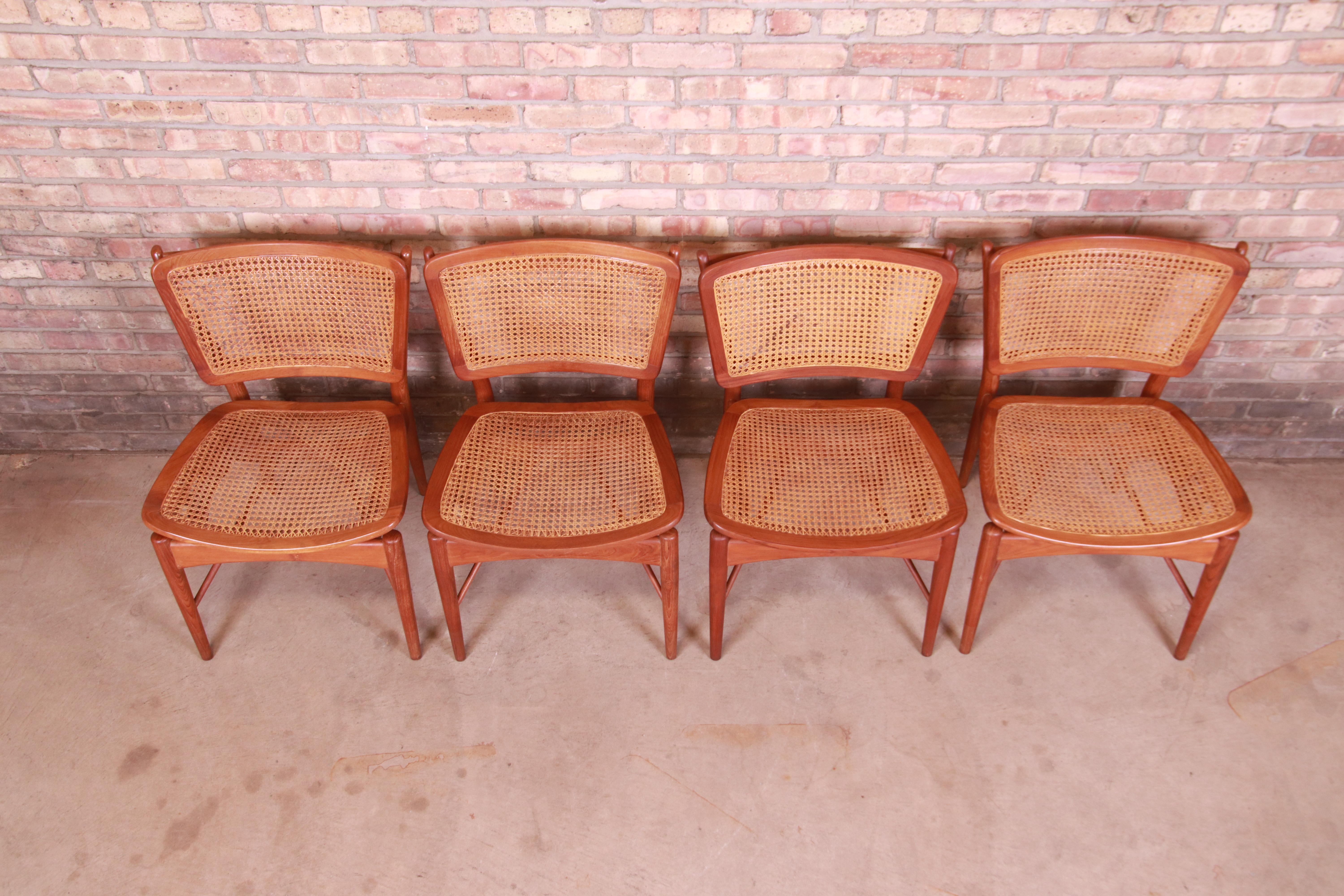 Mid-20th Century Finn Juhl for Baker Furniture Teak and Cane Dining Chairs, Set of Four
