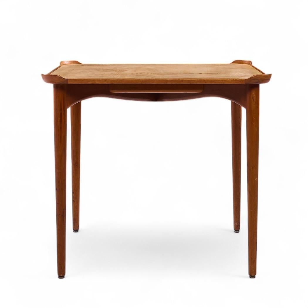 Finn Juhl for Baker Mid Century Teak Game Table

This game table measures: 32.25 wide x 32.25 deep x 29.25 inches high

All pieces of furniture can be had in what we call restored vintage condition. That means the piece is restored upon purchase so