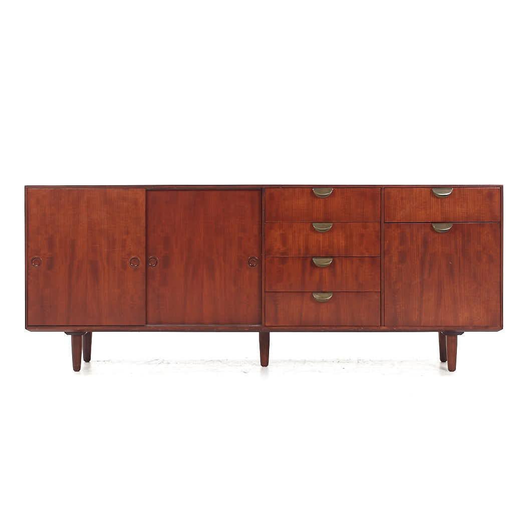 Finn Juhl for Baker Mid Century Walnut Credenza

This credenza measures: 66 wide x 15 deep x 26.5 inches high

All pieces of furniture can be had in what we call restored vintage condition. That means the piece is restored upon purchase so it’s free