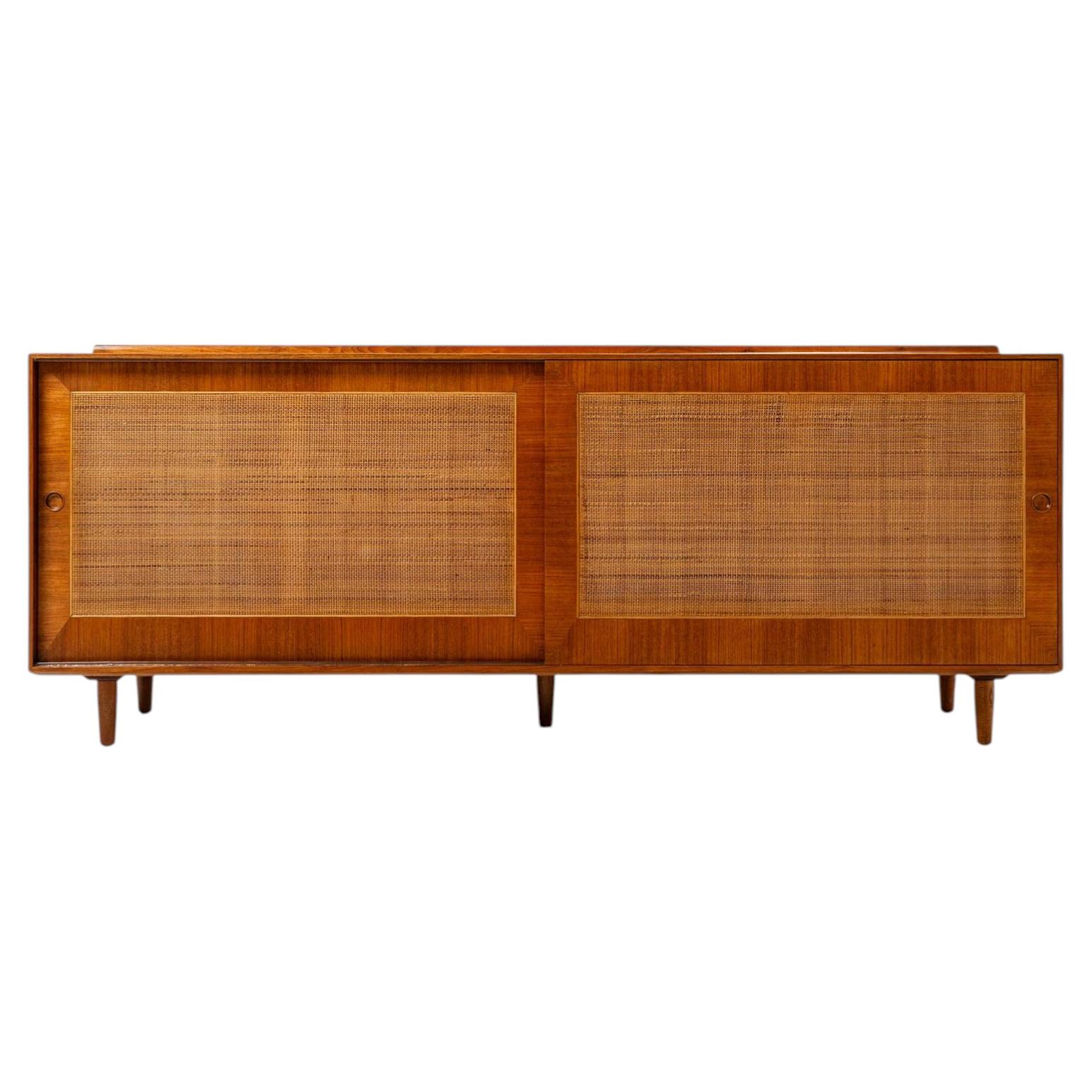 Credenze Finn Juhl per Baker, modello 40 1/2, in noce e vimini, anni '50 in vendita