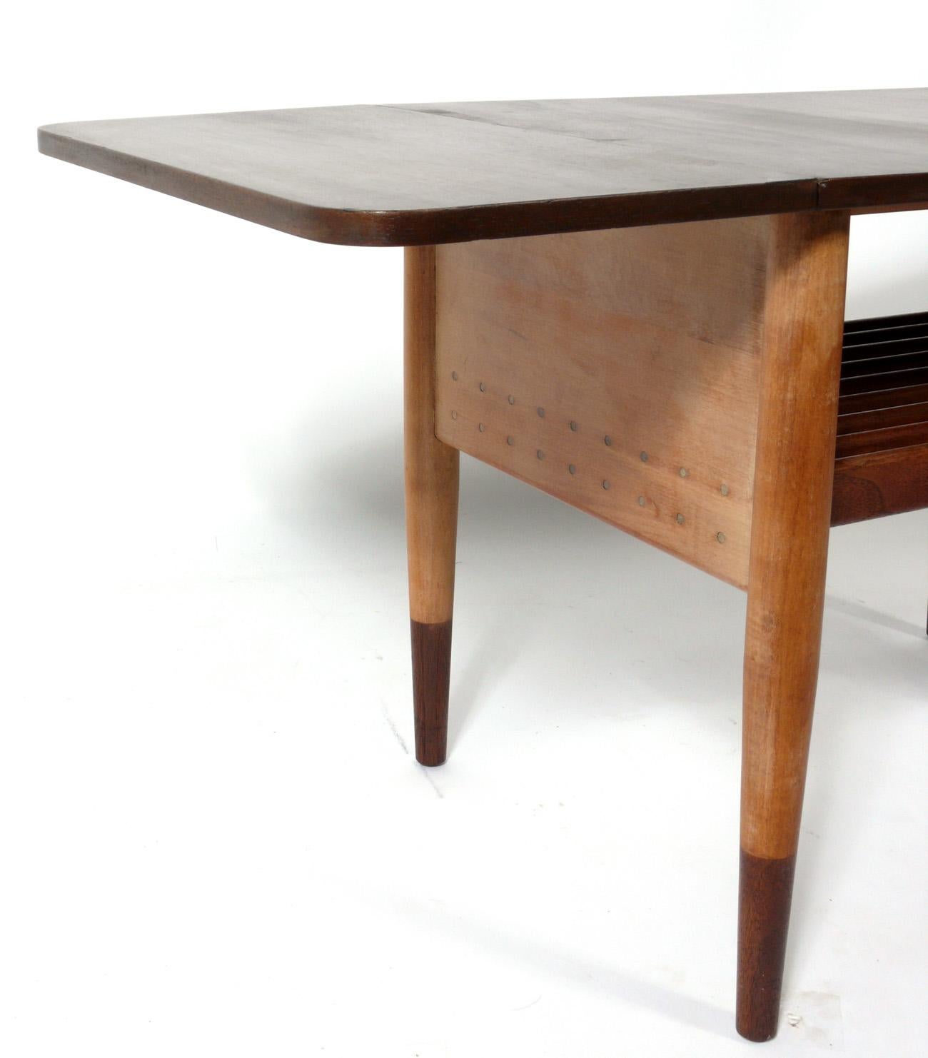 Rare Danish modern design coffee or end table, designed by Finn Juhl for Baker, American, circa 1950s. Signed with Baker medallion and branded model number underneath. Constructed of beech and walnut. This piece is a versatile size and can be used