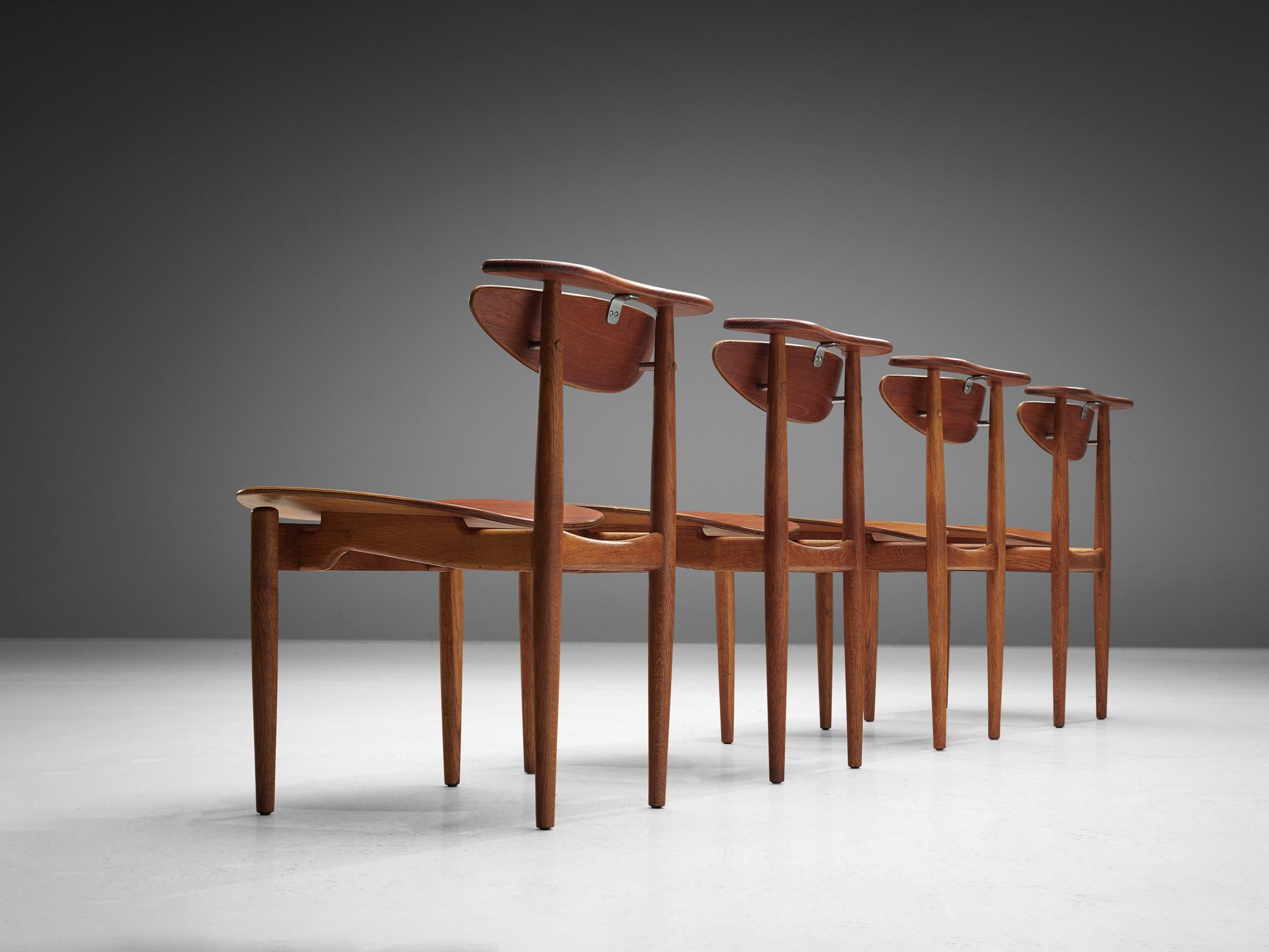 Finn Juhl for Bovirke, set of four 'reading' dining chairs, oak, teak, metal, Denmark, 1953

In 1953, Finn Juhl designed this 'Reading Chair' for Bovirke. The chair is organically shaped featuring curvaceous forms and round finishes. The backrest