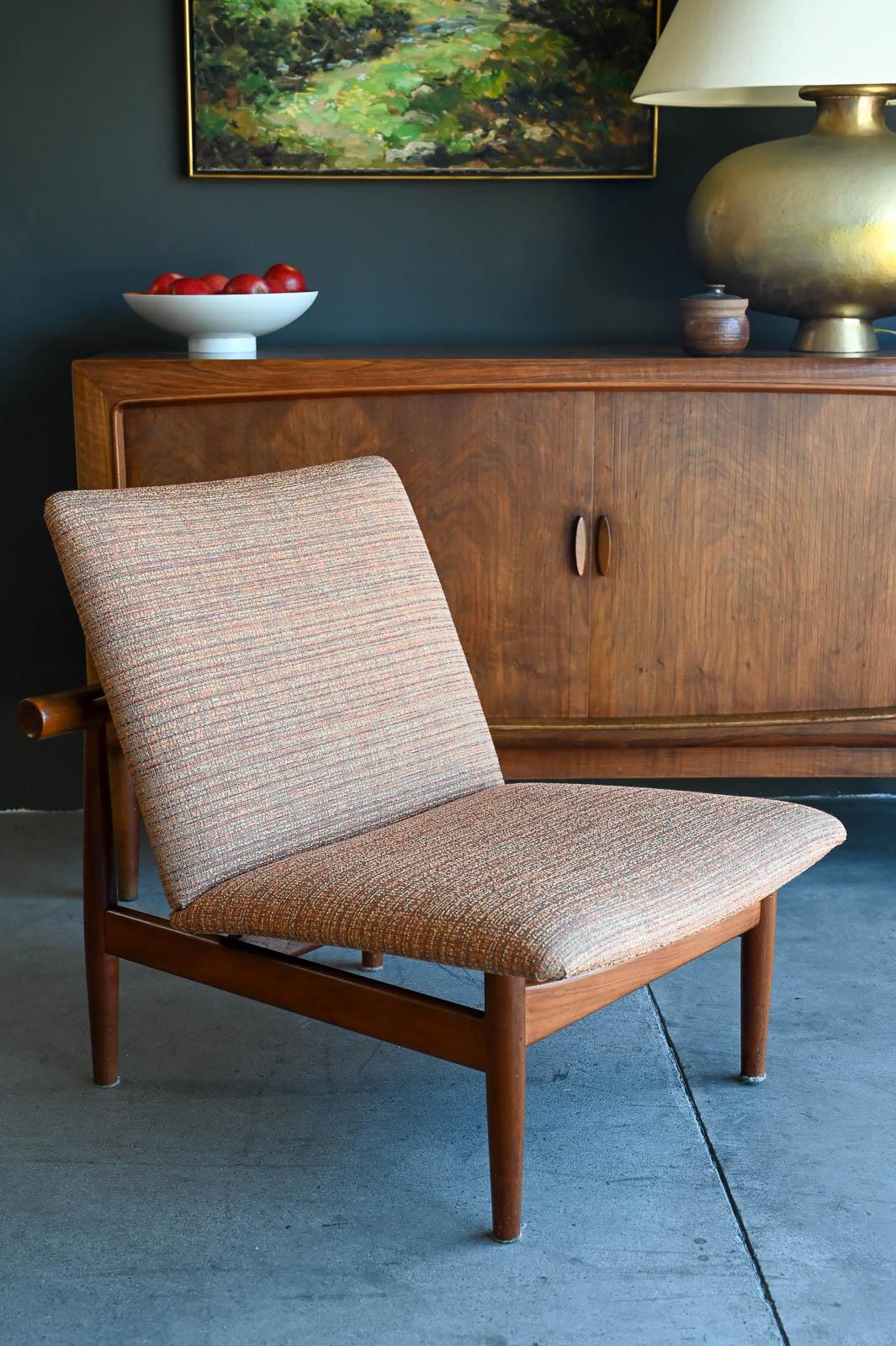 Finn Juhl for France and Daverkosen  Model 137 'Japan' Chair, 1955.  All original unrestored Finn Juhl Japan Chair acquired from original owner purchased in Southern California in the late 1950's.  Original upholstery and teak frame with brass