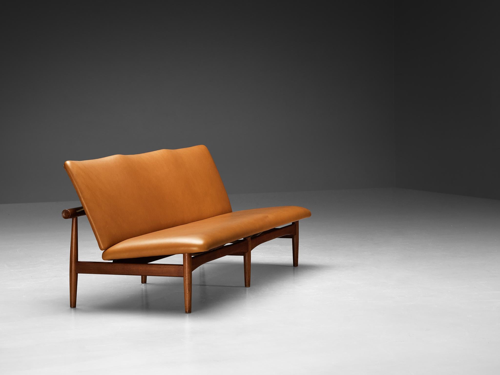 Finn Juhl for France & Søn, 'Japan' sofa, model ‘137/3’, teak, brass, reupholstered in leather 