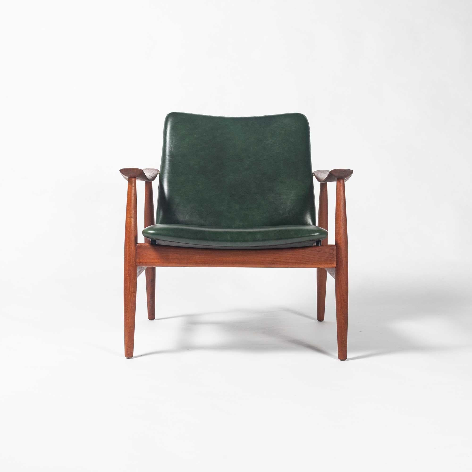 Finn Juhl’s Model FD138 chair for France & Son is an understated and elegant lounge chair in his collection. The backrest independently pivots depend on the seating position. 
This particular model is made out of solid teak, fully restored and