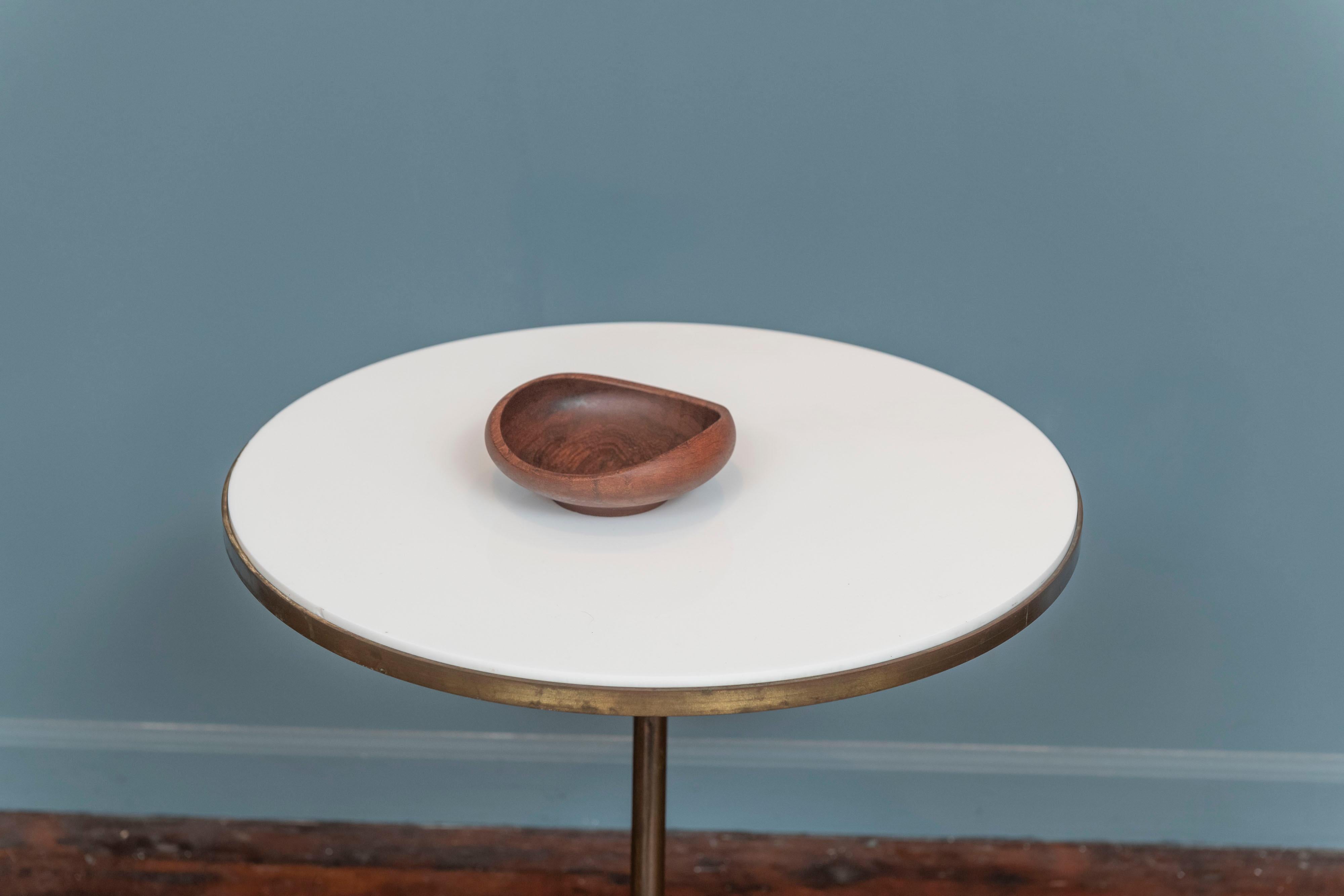 Danish modern teak bowl designed by Finn Juhl for Kay Bojesen, Denmark. Turned from a single piece of teak wood into an organic modern shape. Polished and clean, with original patina to the wood. 
Compact size for everyday functionality, we suggest