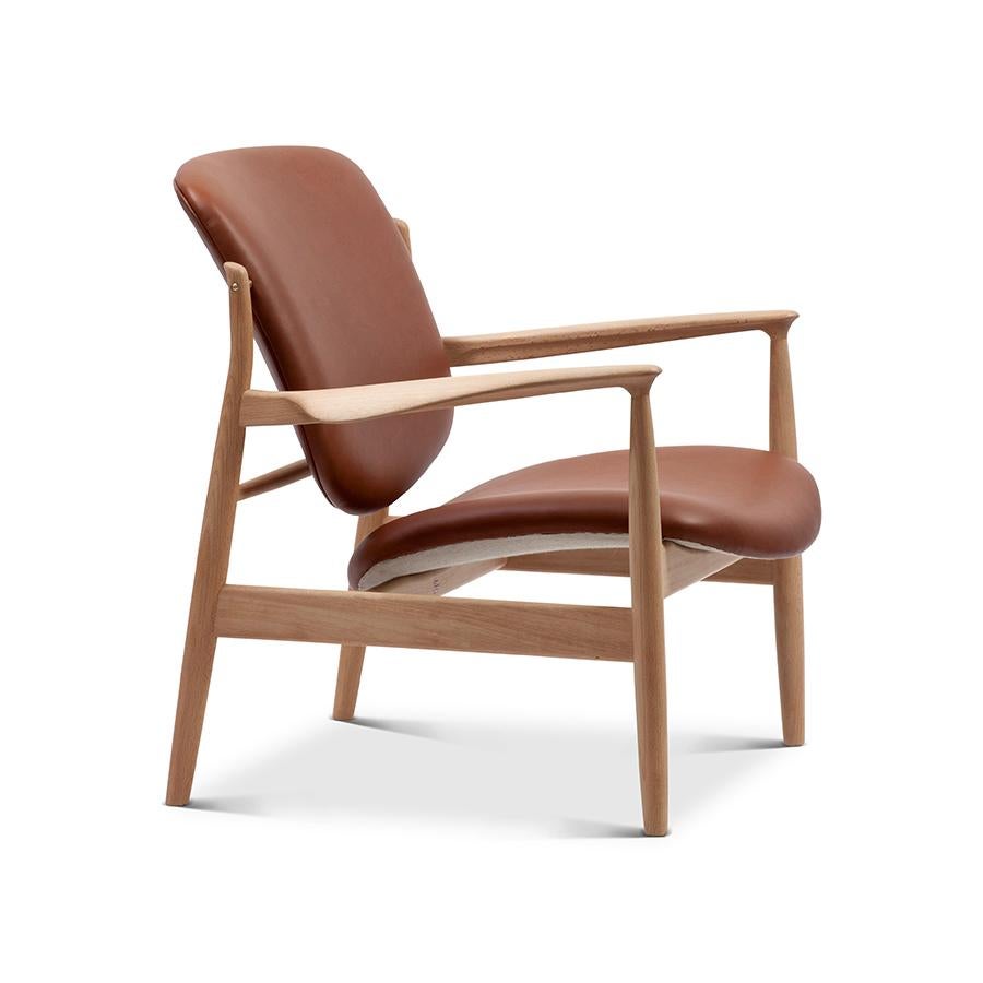 Armchair designed by Finn Juhl in 1956, relaunched in 20016.
Manufactured by House of Finn Juhl in Denmark.

Finn Juhl rode a wave of international success during the 1950s - in part thanks to his partnership with the Danish furniture