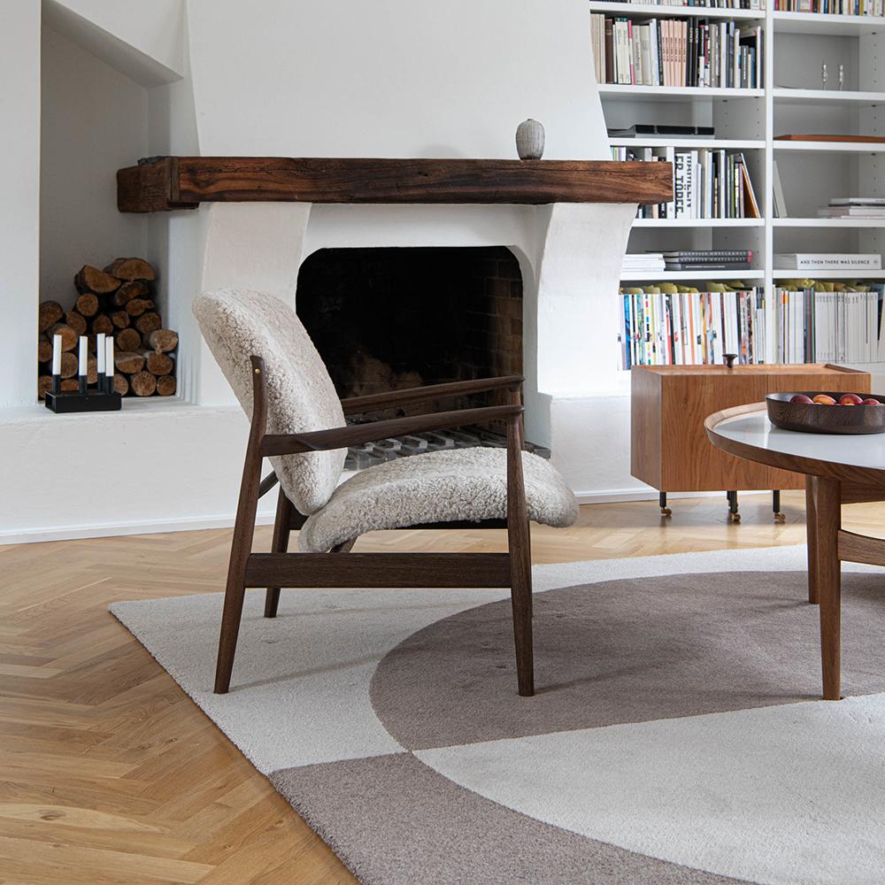 Contemporary Finn Juhl France Chair in Wood and Sheepskin Upholstery 