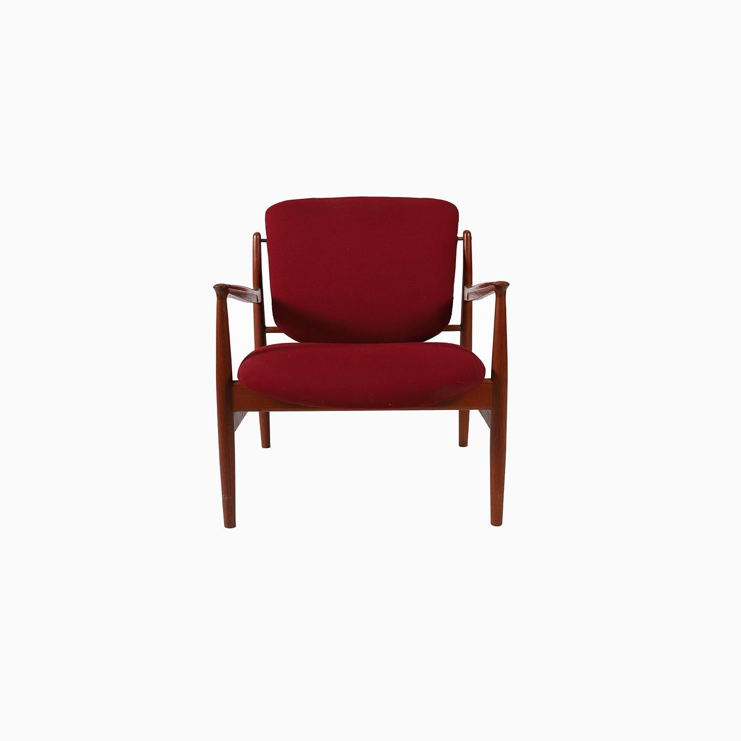 
the france lounge was designed by Finn Juhl in the 1950's and produced in Denmark by France & Daverkorsen.  this chair is an earlier example of the design and it is in excellent condition.  the sculptural armrests taper to 'knife edge' exterior