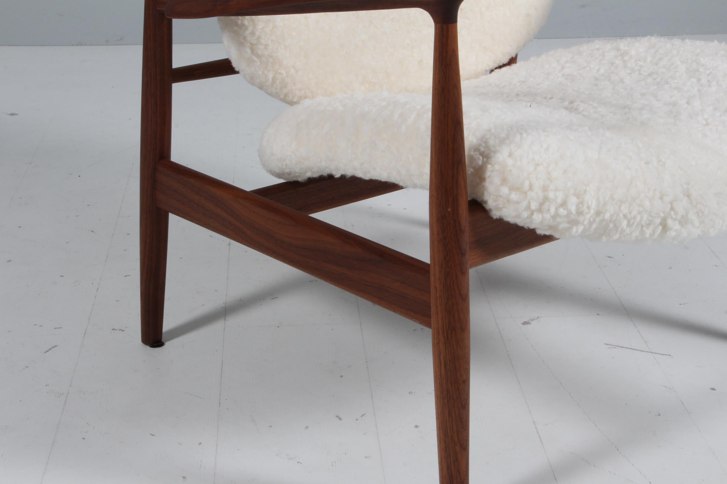 Danish Finn Juhl France lounge chair in sheepskin, walnut For Sale