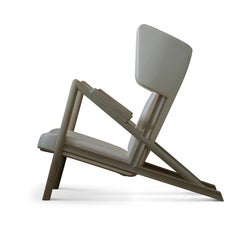Poltrona "Grasshopper" di Finn Juhl in legno di rovere e pelle