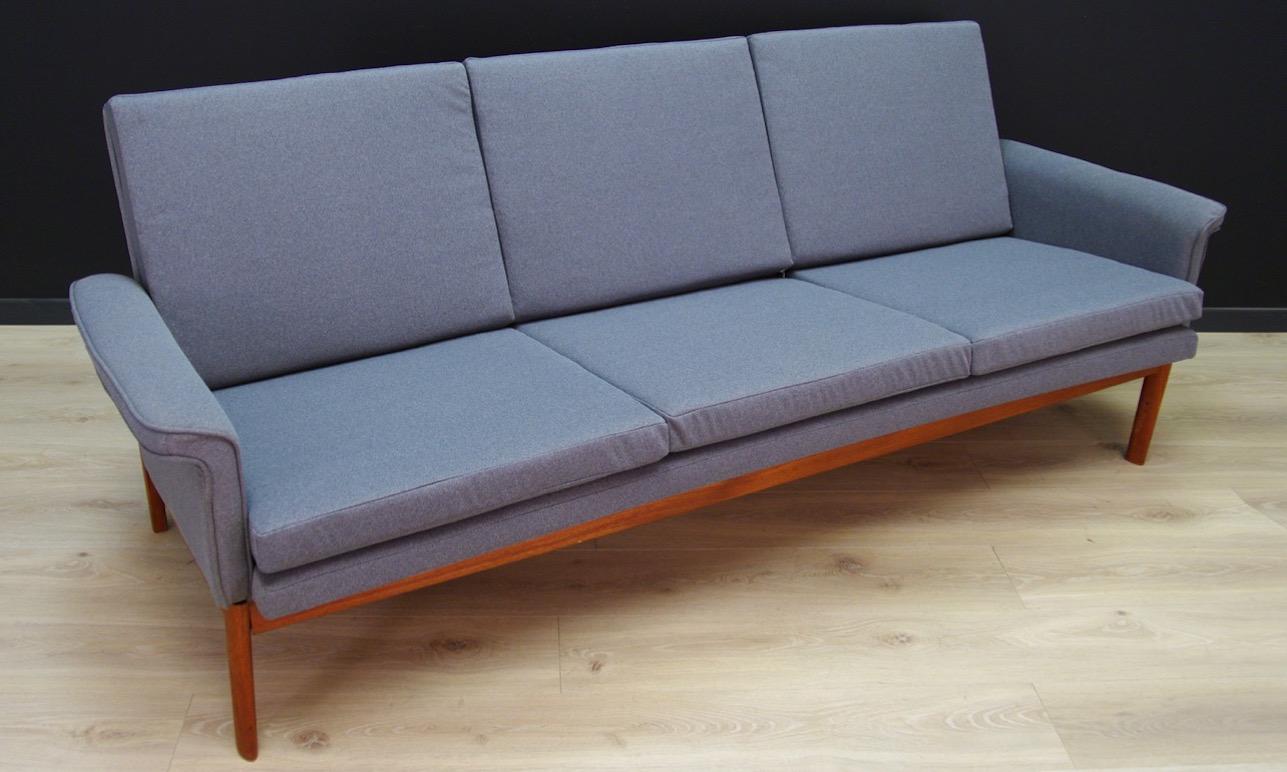 A unique sofa from the 1960s, designed by Finn Juhl, model Jupiter, produced in the France & Son manufacture. Minimalist form - Scandinavian design at its best. Phenomenal wooden construction, new upholstery (color - gray). Preserved in good