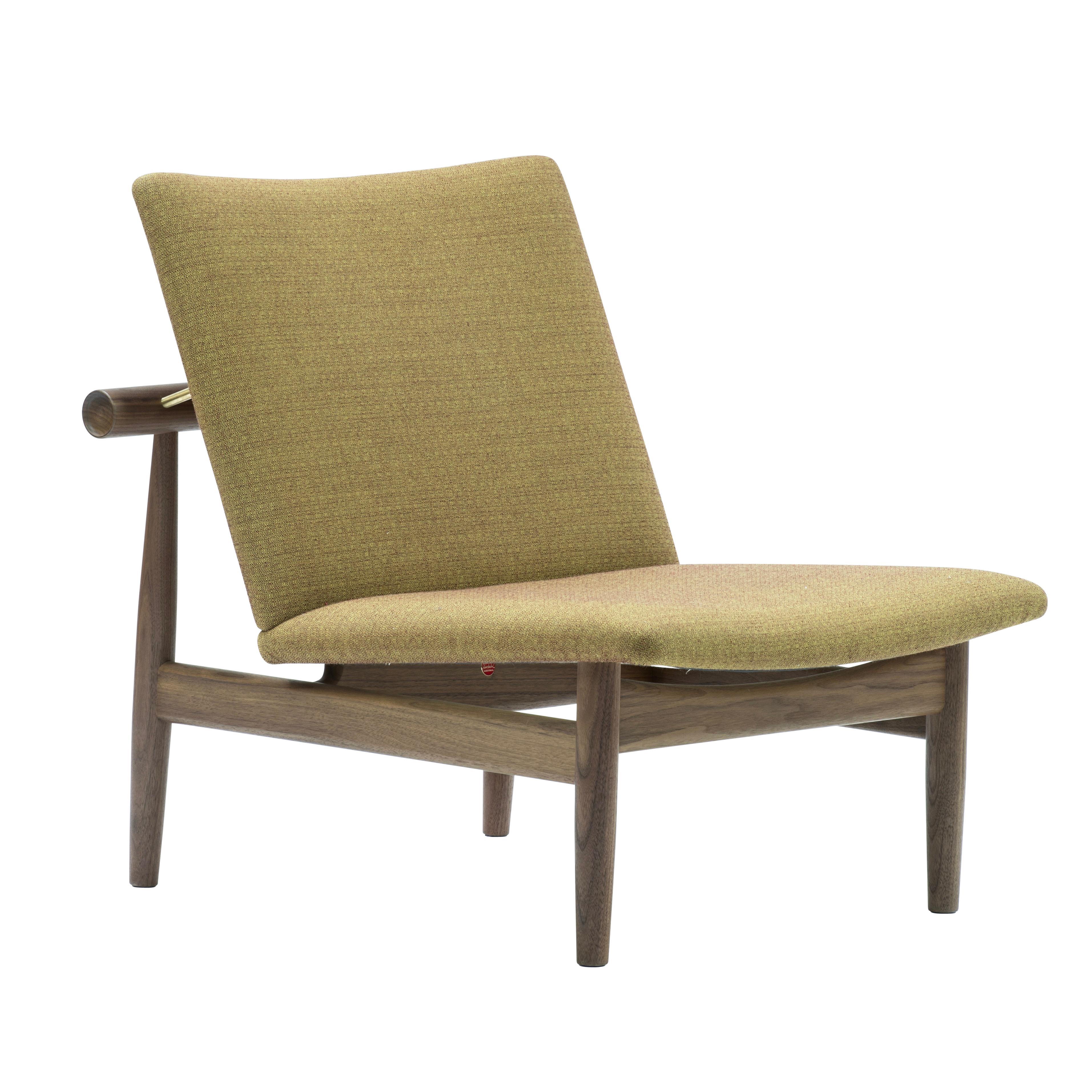 Japan chair designed by Finn Jhul
Manufactured by One collection Finn Juhl (Denmark)

The Japan Series is produced in oak or walnut with handsewn upholstery in fabric.

1953, relaunched in 2007

Frame: walnut
Upholstery: Fabric Kvadrat Foss

Size: W