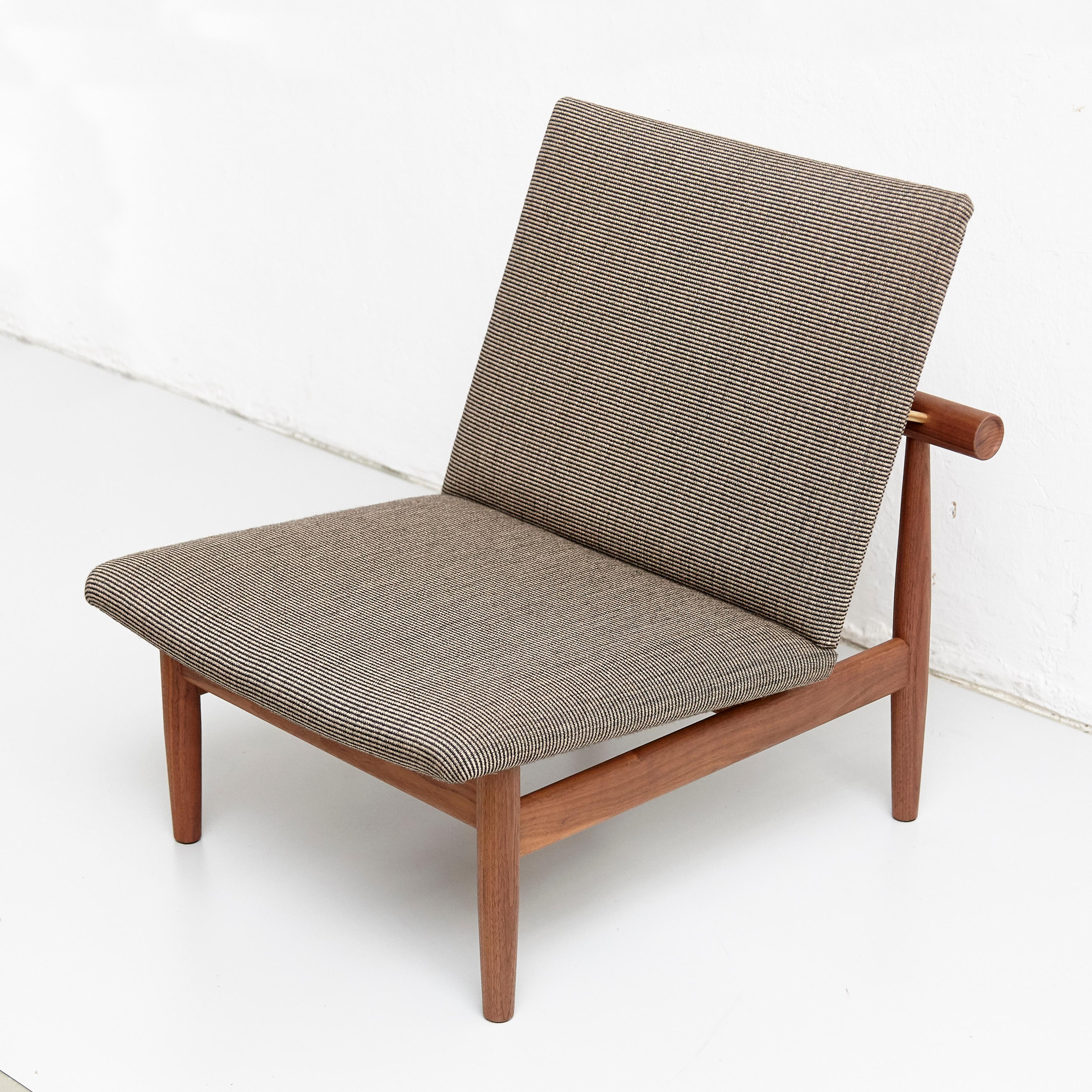 Chair designed by Finn Juhl in 1957, relaunched in 2007.
Manufactured by House of Finn Juhl in Denmark.

Finn Juhl’s partnership with the furniture manufacturer France & Son gave birth to a series of furniture well-suited for industrial