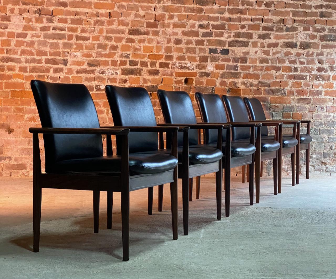 Finn Juhl model 209 diplomat chairs in rosewood and leather set of six by Cado, 1965

Midcentury Danish design Finn Juhl model 209 diplomat rosewood armchairs manufactured by Cado in Denmark, circa 1965. This model known as the diplomat is a very