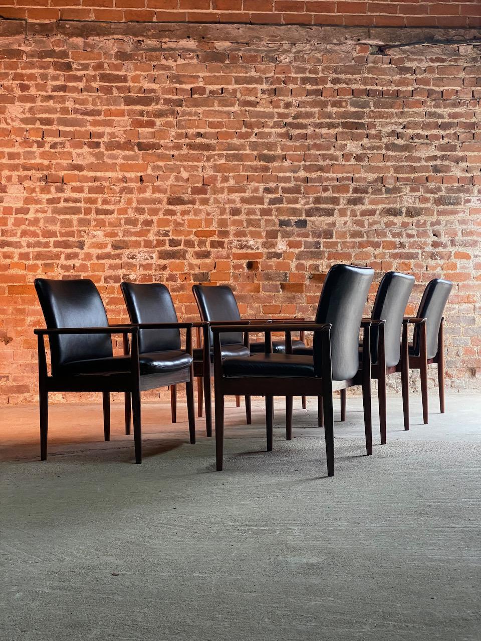 Finn Juhl Model 209 Diplomat chairs in rosewood and leather set of six by Cado, 1965.

Midcentury Danish design Finn Juhl Model 209 Diplomat rosewood armchairs manufactured by Cado in Denmark, circa 1965. This model known as the Diplomat is a very