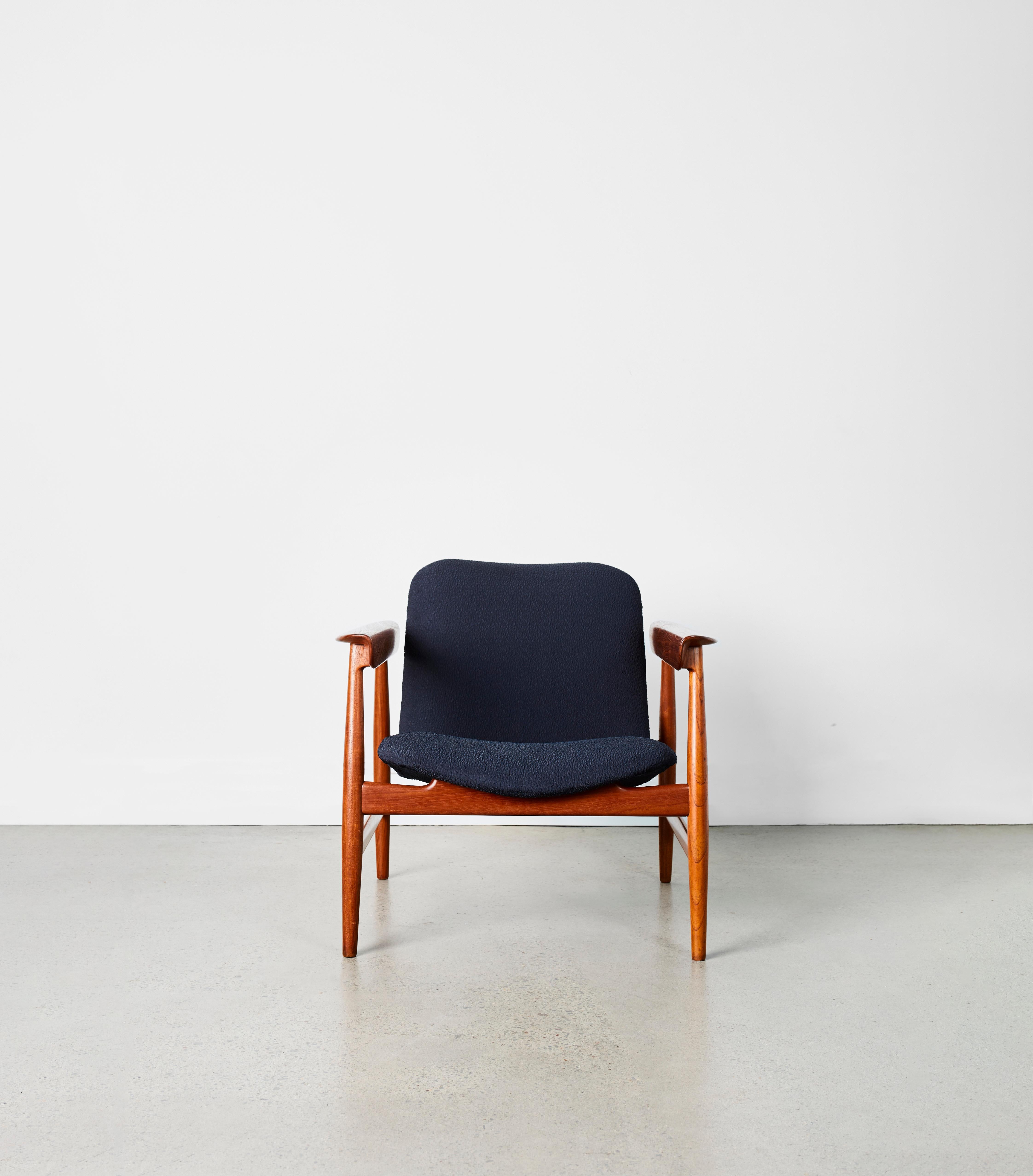 This incredibly beautiful Finn Juhl chair by Bovirke BO-118 is a true statement. This chair has been restored and upholstered in a stunning deep blue fabric

A rare chair by Bovirke executed in teak. Beautifully simple and visually dramatic. the
