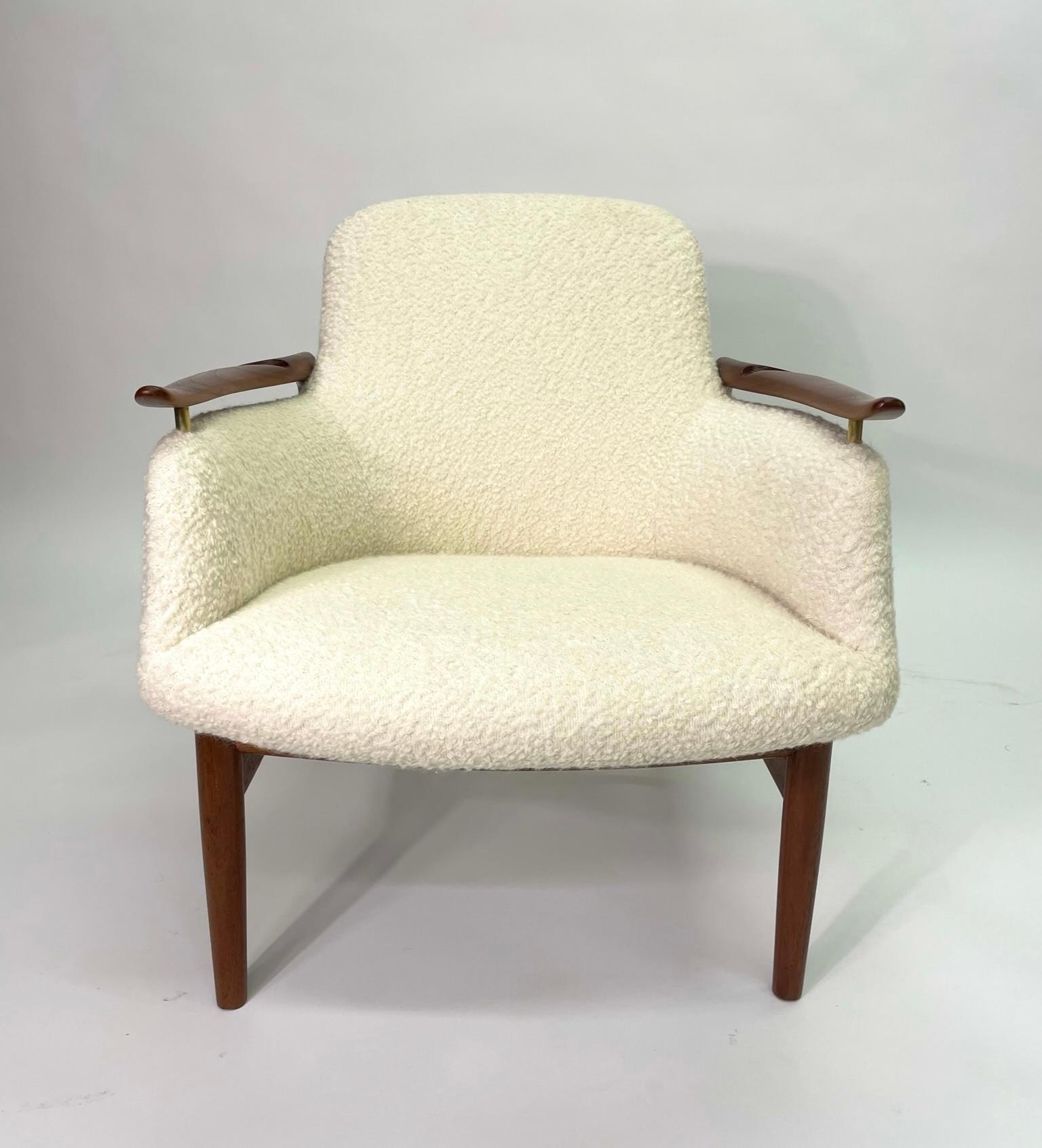 A rare example of the stunning, chair by Danish design pioneer Finn Juhl. The NV-53 is named after its cabinetmaker, Niels Vodder, and the year of its design, 1953. Its biomorphic shape—influenced by the Surrealists—and unique, floating design give