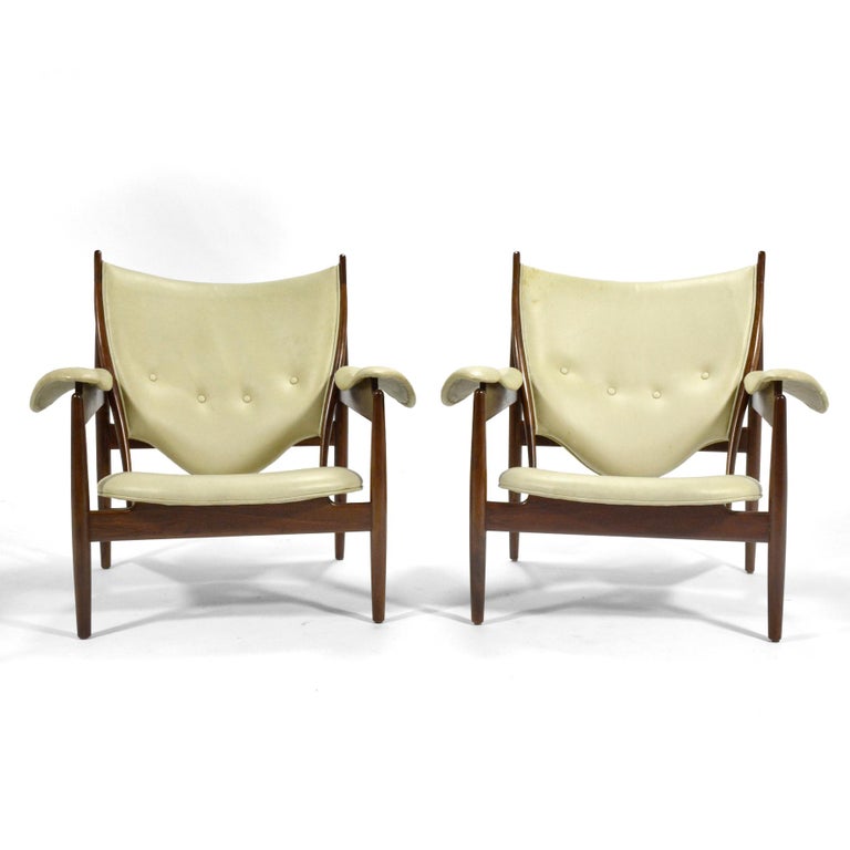 Finn Juhl's 1949 masterpiece, the chieftain chair, employs iconography of tribal forms and Juhl’s innovative approach to design which accentuates the separation of the seat, back, and frame imparting a “floating appearance”. The distinctive “horns’