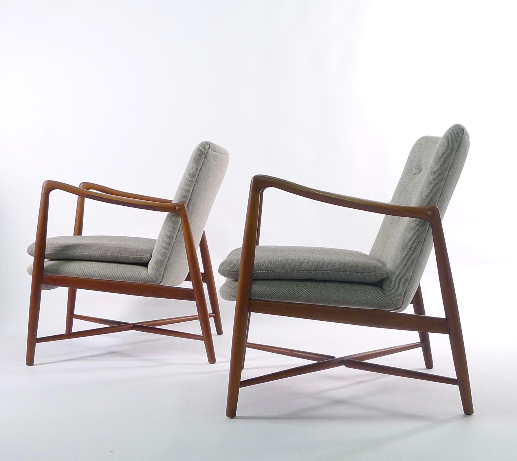 A rare pair of easy chairs, model BO59, designed by Finn Juhl and manufactured by Bovirke, Denmark, circa 1946.

This iconic design is known as the Westermanns Kaminstol or Fireside Chair.

Beautiful teak wood frames, stamped by manufacturer, newly