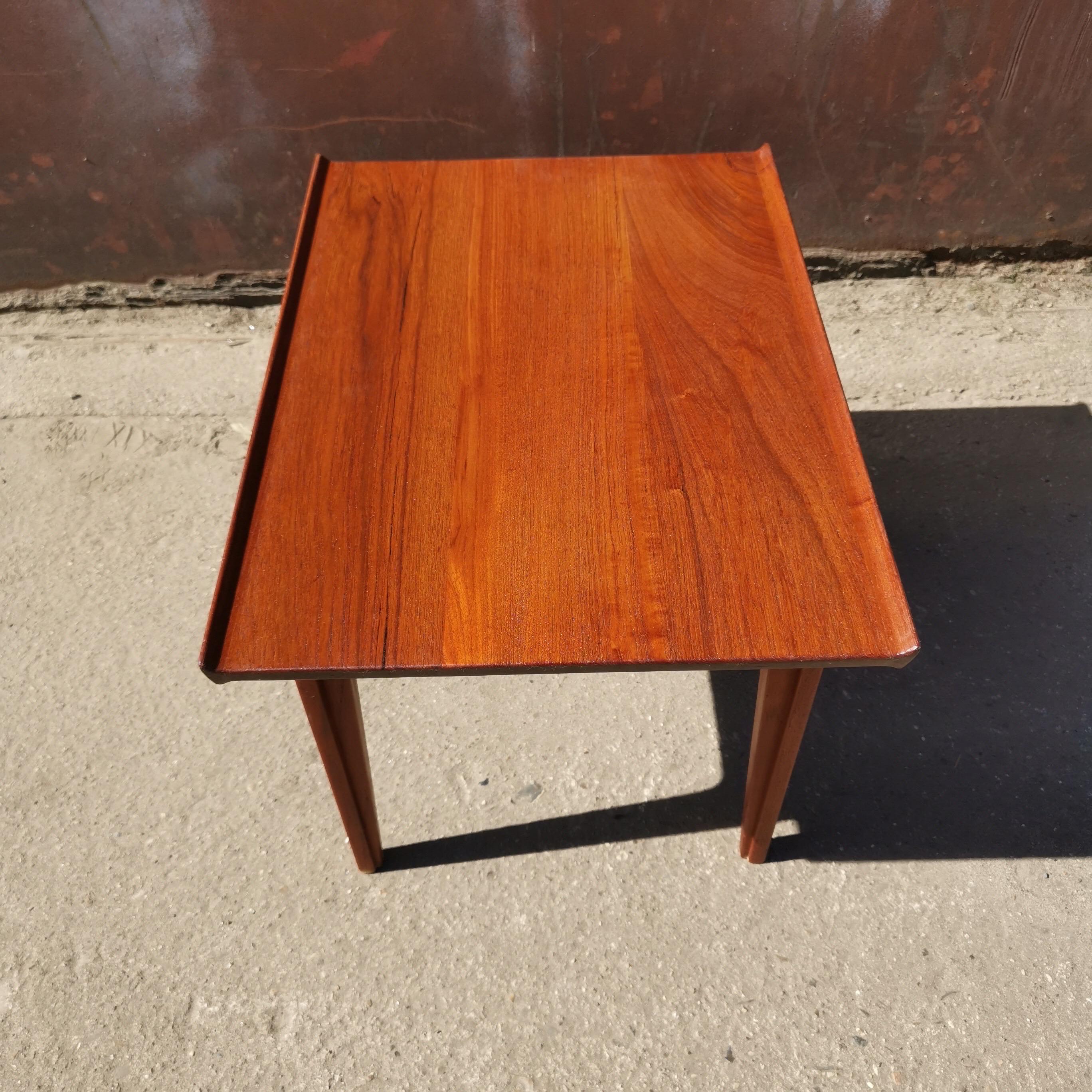 Rare side table by Finn Juhl in solid teakwood. Model 