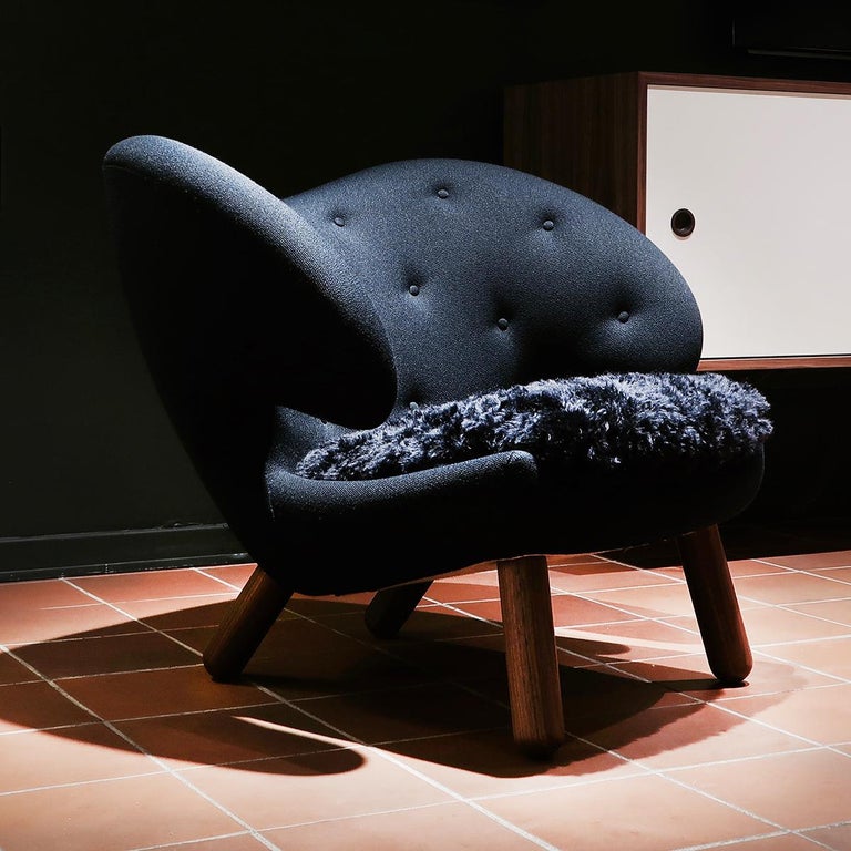 Pelican chair designed by Finn Juhl in 1940.
Manufactured by House of Finn Juhl in Denmark.

Pelican chair was probably the one furthest ahead of its time. When it was presented at the Copenhagen Cabinetmakers’ Guild Exhibition in 1940, it stood