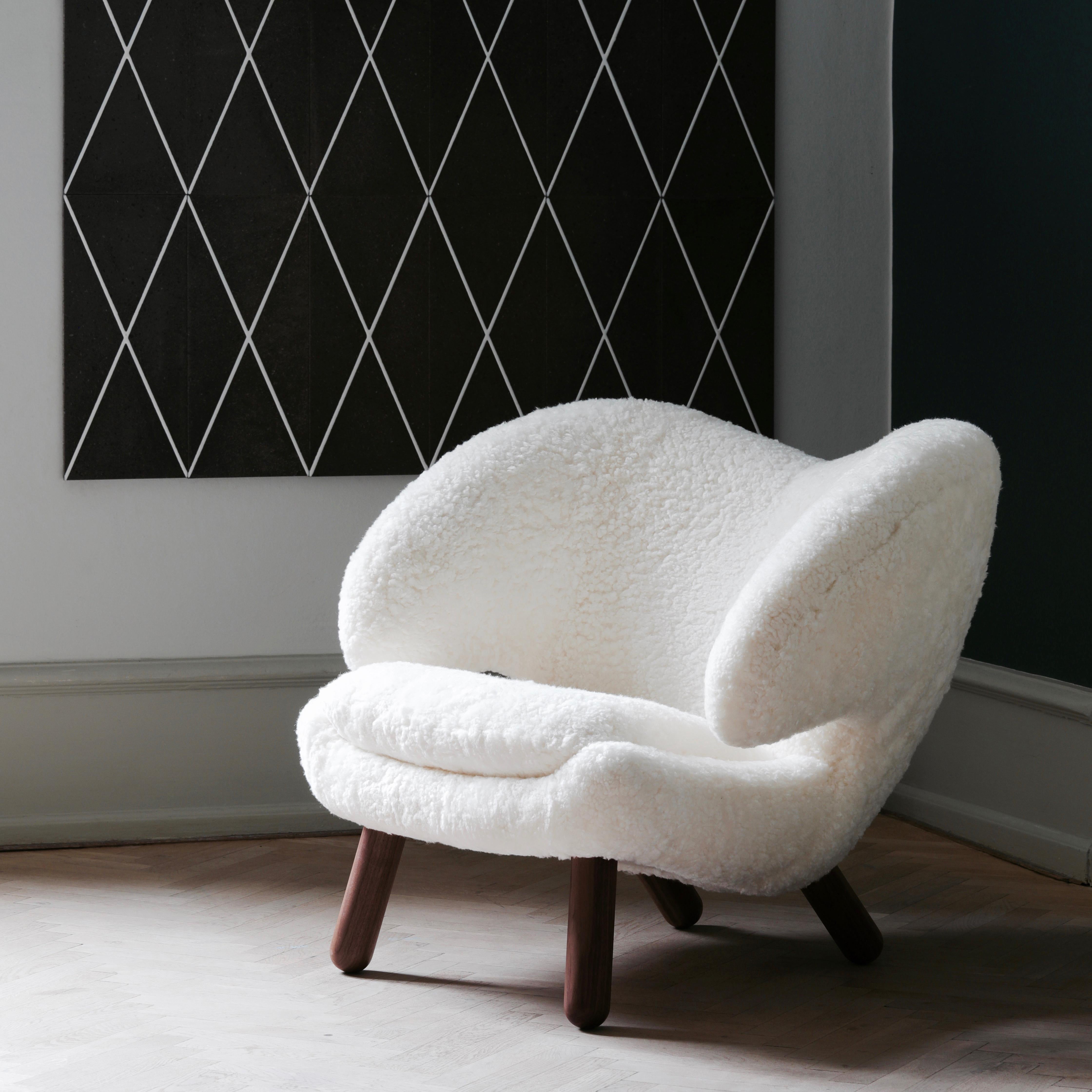 Pelican chair designed by Finn Juhl 
Manufactured by One Collection Finn Juhl in Denmark

Pelican chair was probably the one furthest ahead of its time. When it was presented at the Copenhagen Cabinetmakers’ guild exhibition in 1940, it stood out
