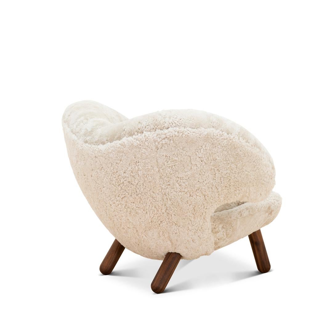 Danish Finn Juhl Pelican Chair Skandilock Sheep Moonlight and Wood For Sale