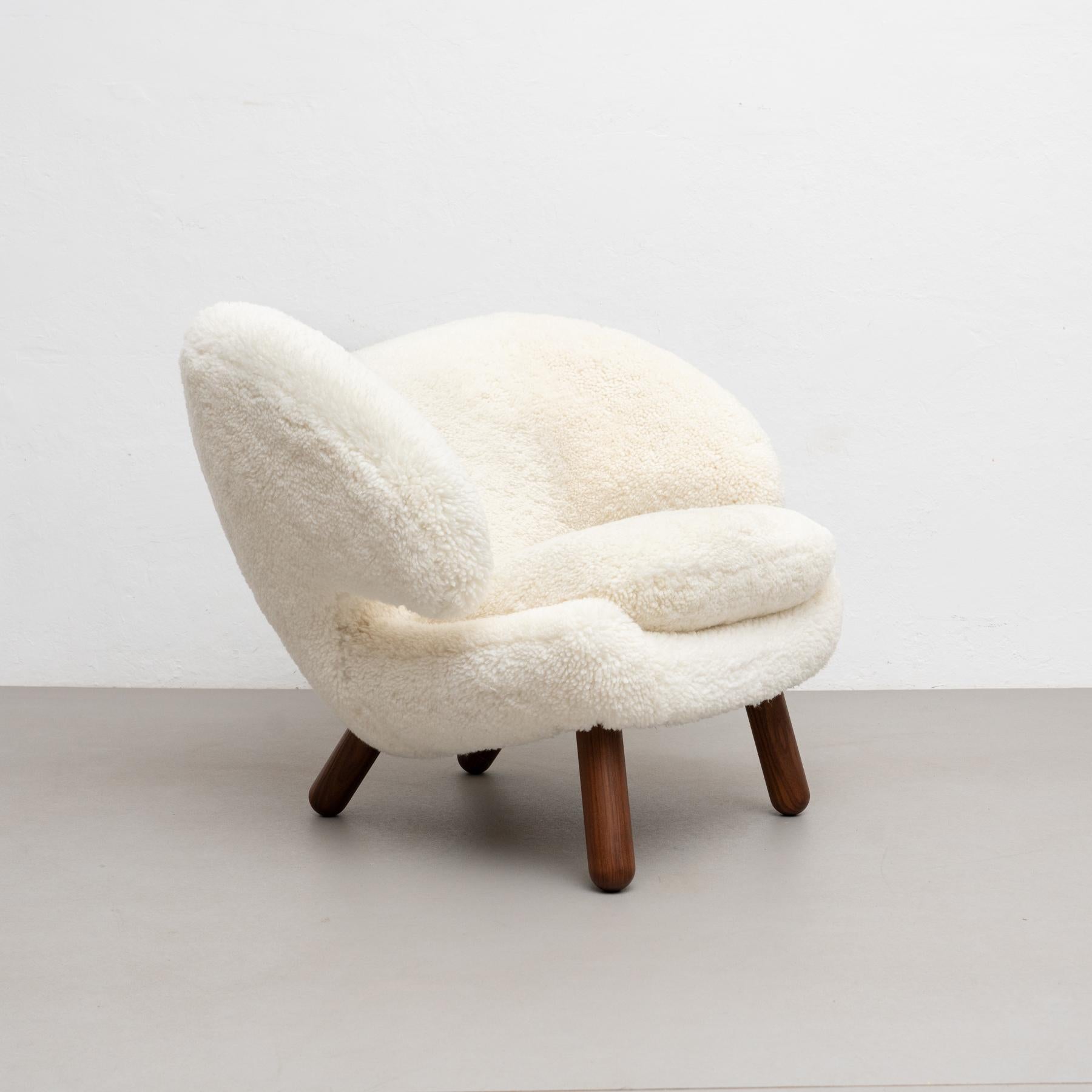 Pelican chair designed by Finn Juhl in 1940, relaunched in 2001.
Manufactured by House of Finn Juhl in Denmark.

Pelican chair was probably the one furthest ahead of its time. When it was presented at the Copenhagen Cabinetmakers’ Guild