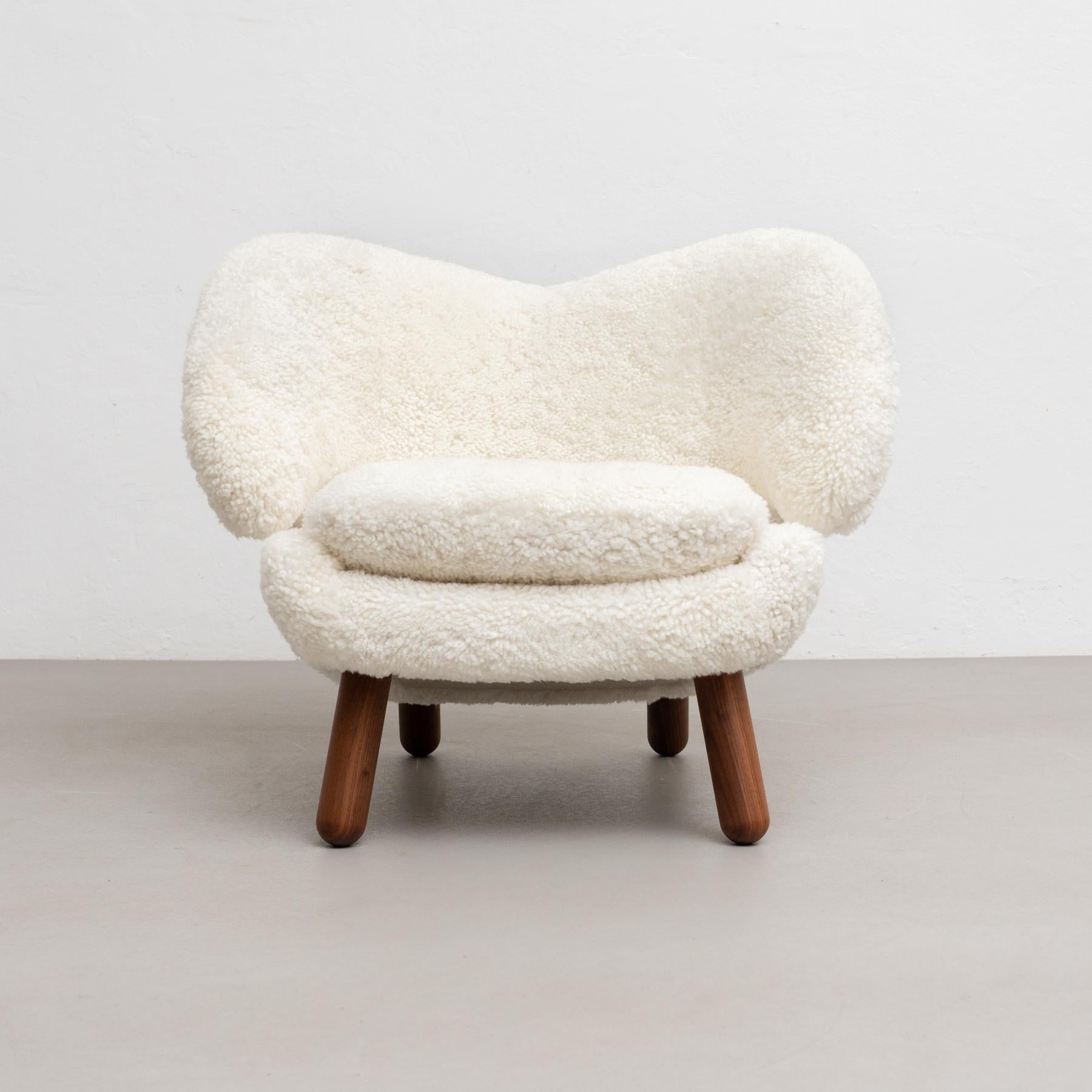 Pelican chair designed by Finn Juhl in 1940, relaunched in 2001.
Manufactured by House of Finn Juhl in Denmark.

Pelican chair was probably the one furthest ahead of its time. When it was presented at the Copenhagen Cabinetmakers’ Guild Exhibition
