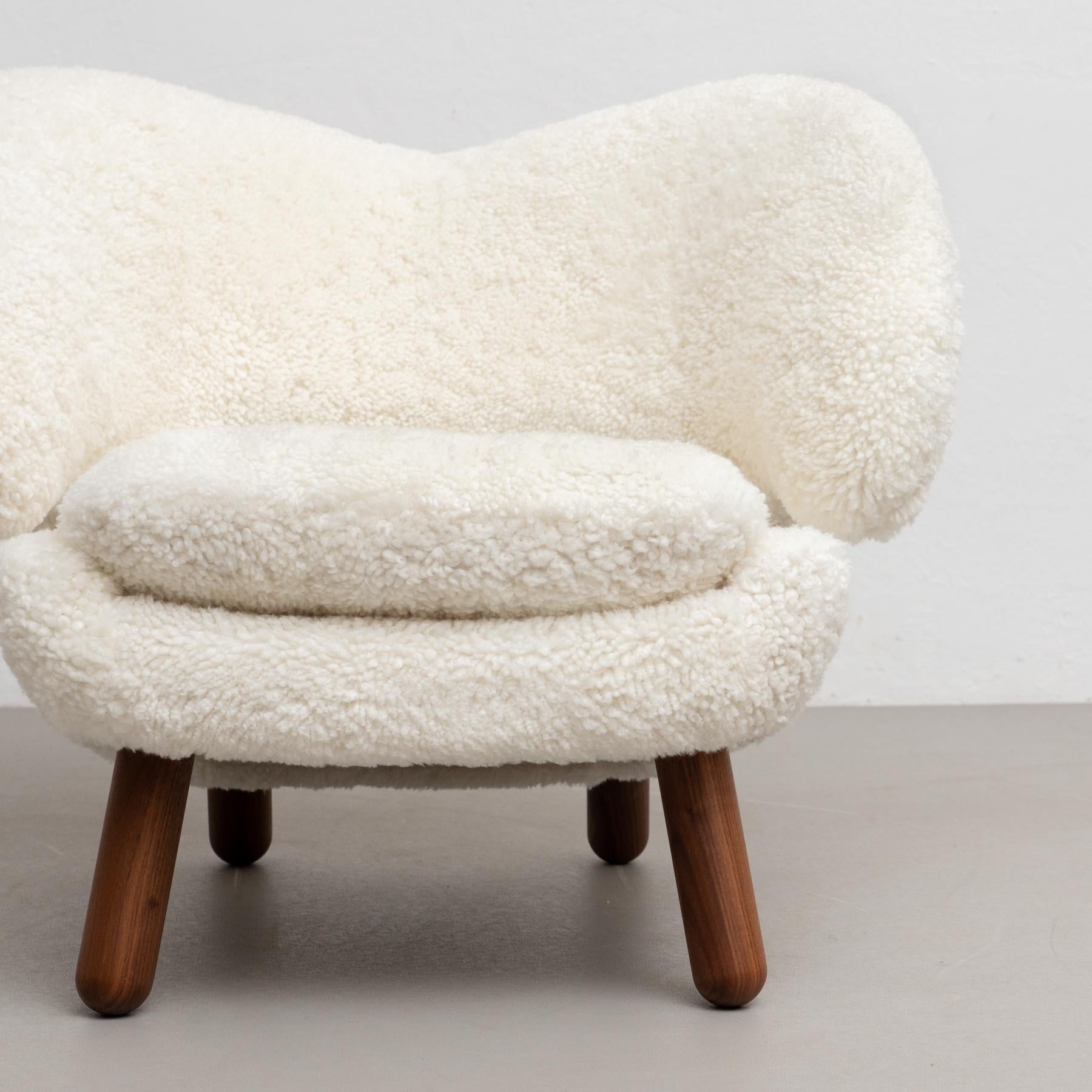 Modern Finn Juhl Pelican Chair Upholstered in Gotland Sheepskin For Sale