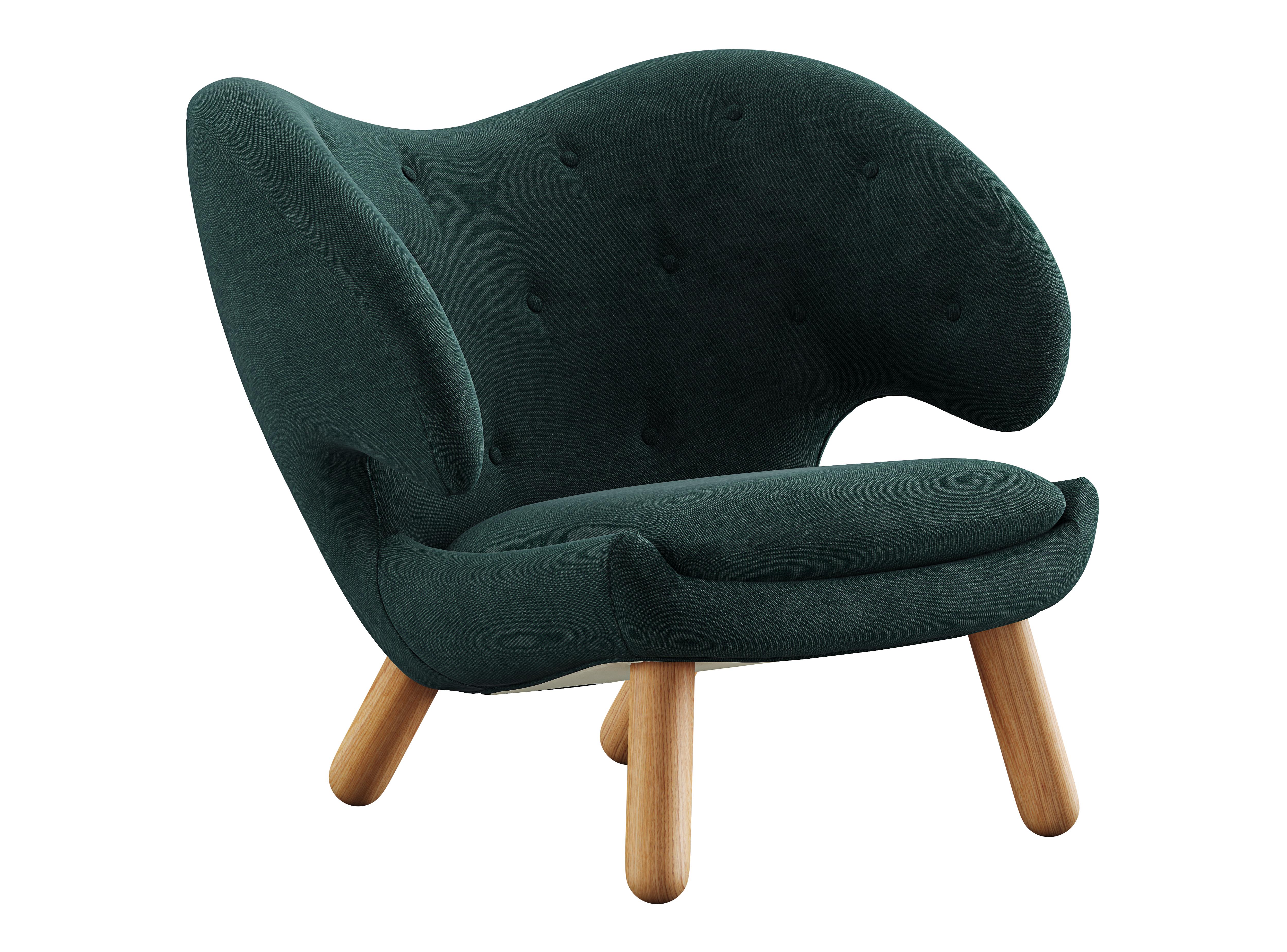 Pelican chair designed by Finn Juhl in 1940.
Manufactured by House of Finn Juhl in Denmark.
Pelican chair was probably the one furthest ahead of its time. When it was presented at the Copenhagen Cabinetmakers’ Guild Exhibition in 1940, it stood out