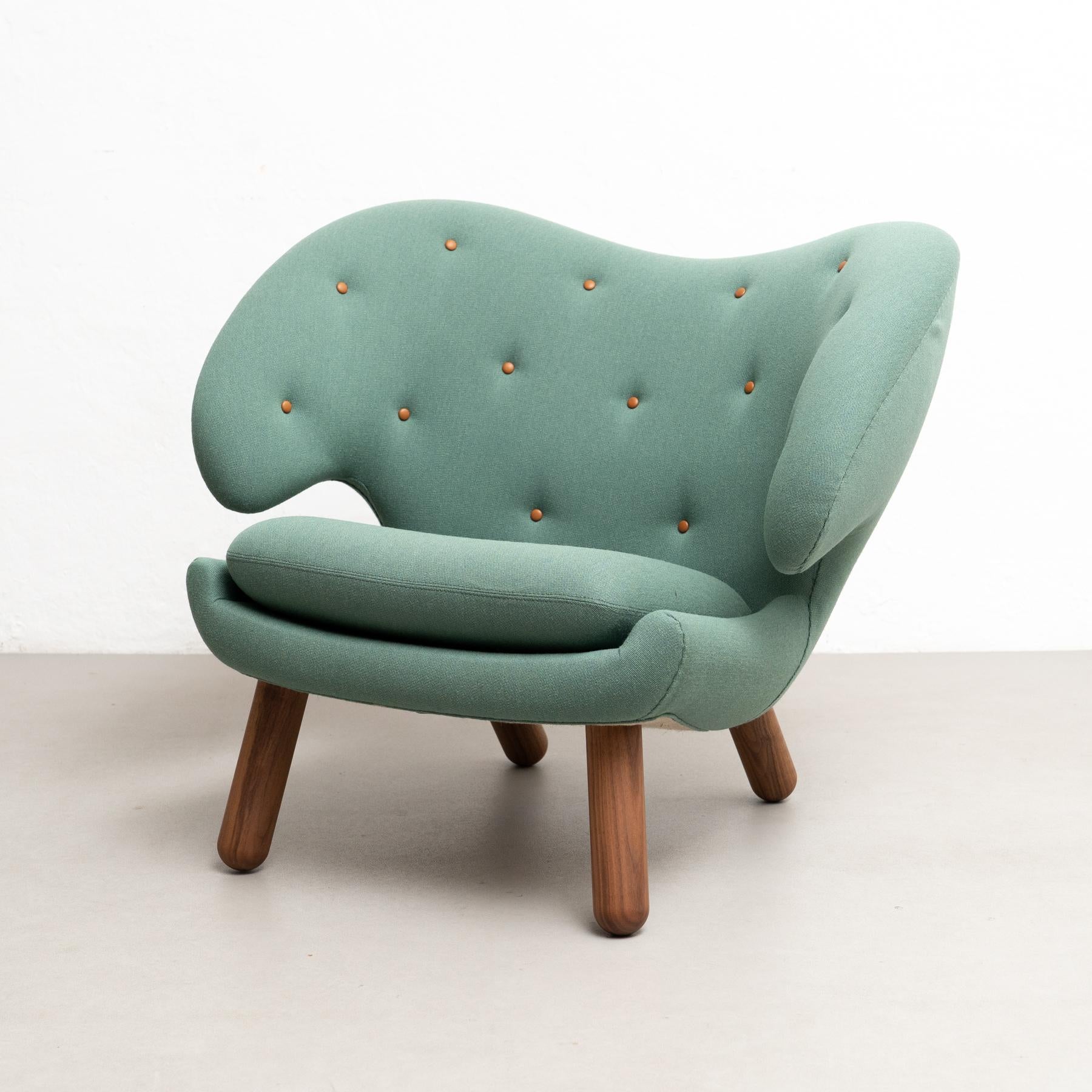 Pelican chair designed by Finn Juhl in 1940.
Manufactured by House of Finn Juhl in Denmark.

Pelican chair was probably the one furthest ahead of its time. When it was presented at the Copenhagen Cabinetmakers’ Guild Exhibition in 1940, it stood out