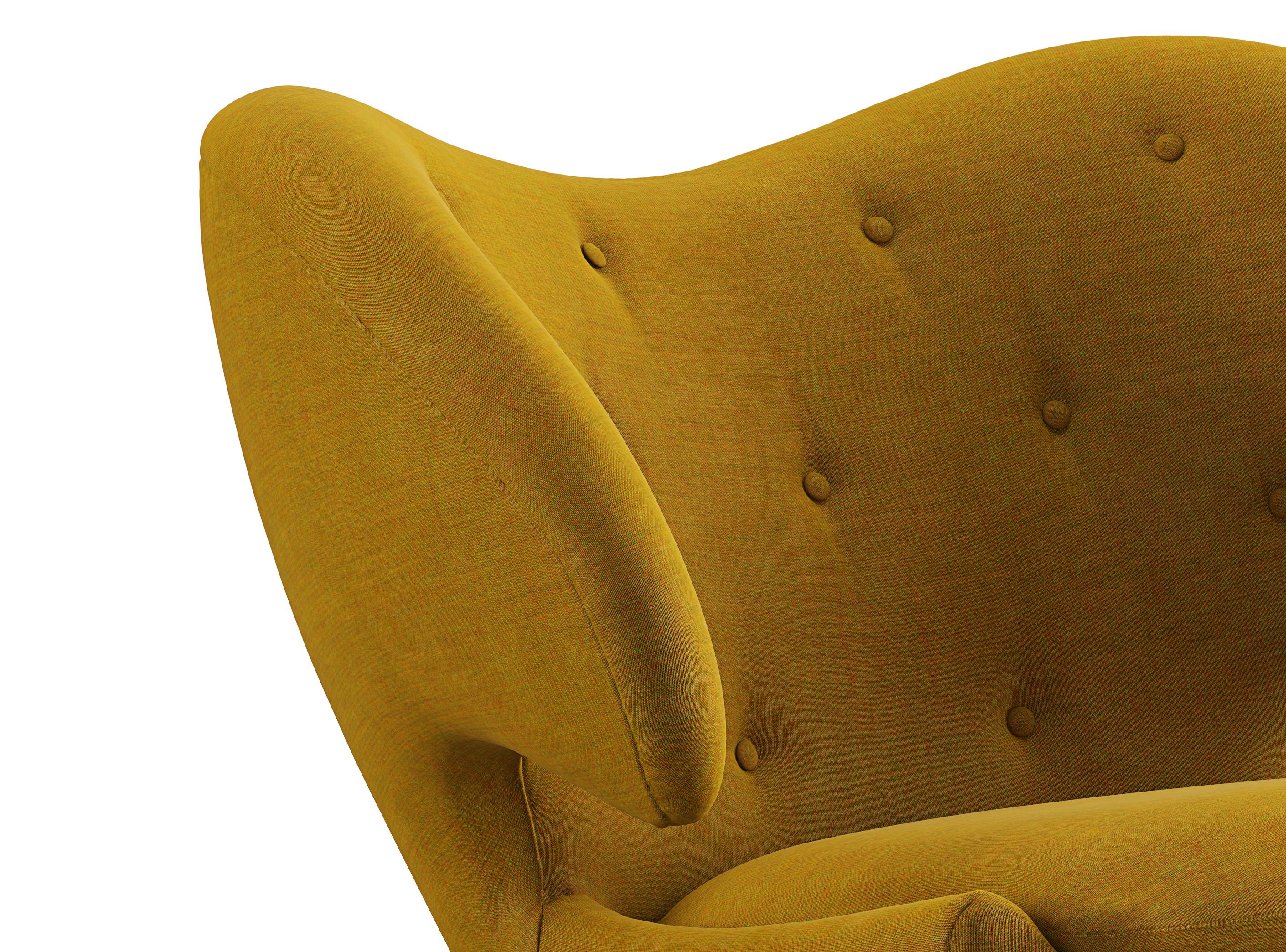 Danish Finn Juhl Pelican Chair Upholstered in Wood and Fabric
