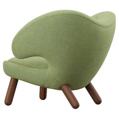 Finn Juhl Sedia Pelican imbottita in Wood e tessuto