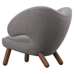 Finn Juhl Sedia Pelican imbottita in Wood e tessuto