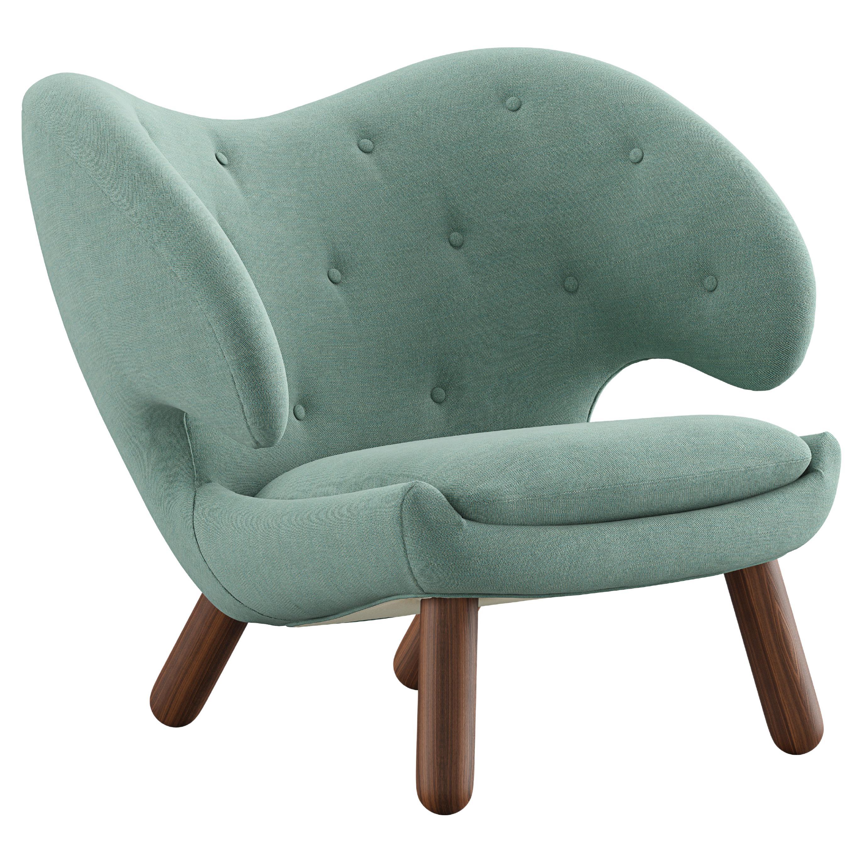 Chaise Pélican Finn Juhl tapissée de bois et de tissu