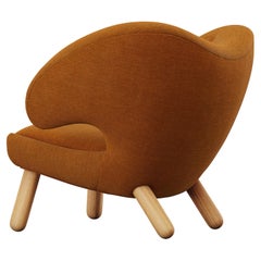 Finn Juhl Pelican Chair Upholstered in Wood and Fabric