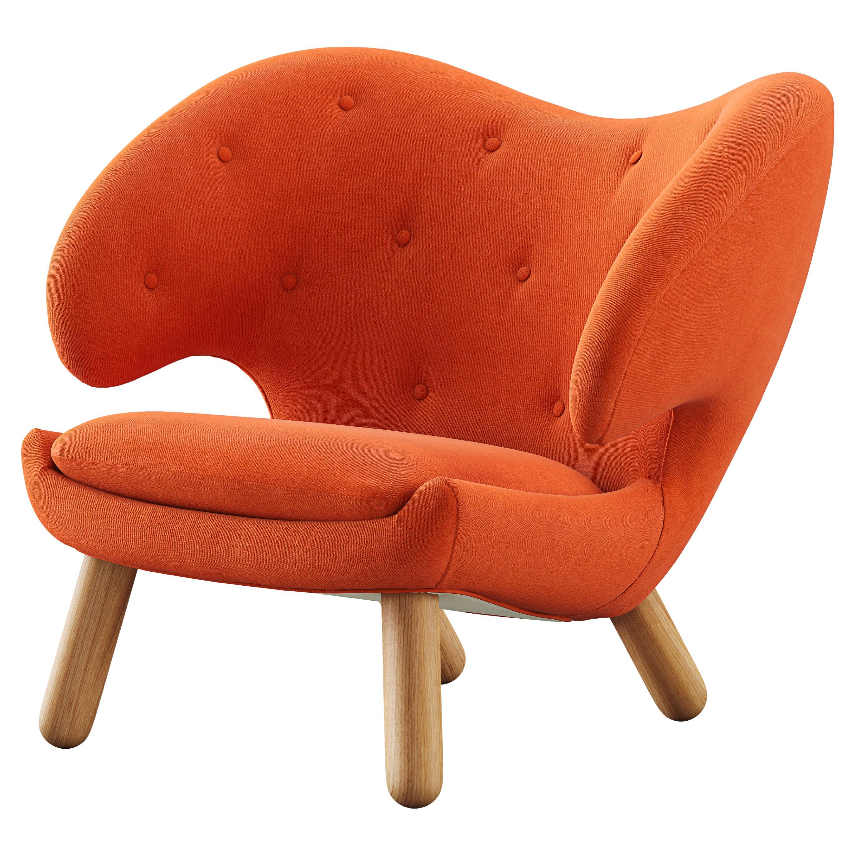 Chaise Pélican Finn Juhl tapissée de bois et de tissu