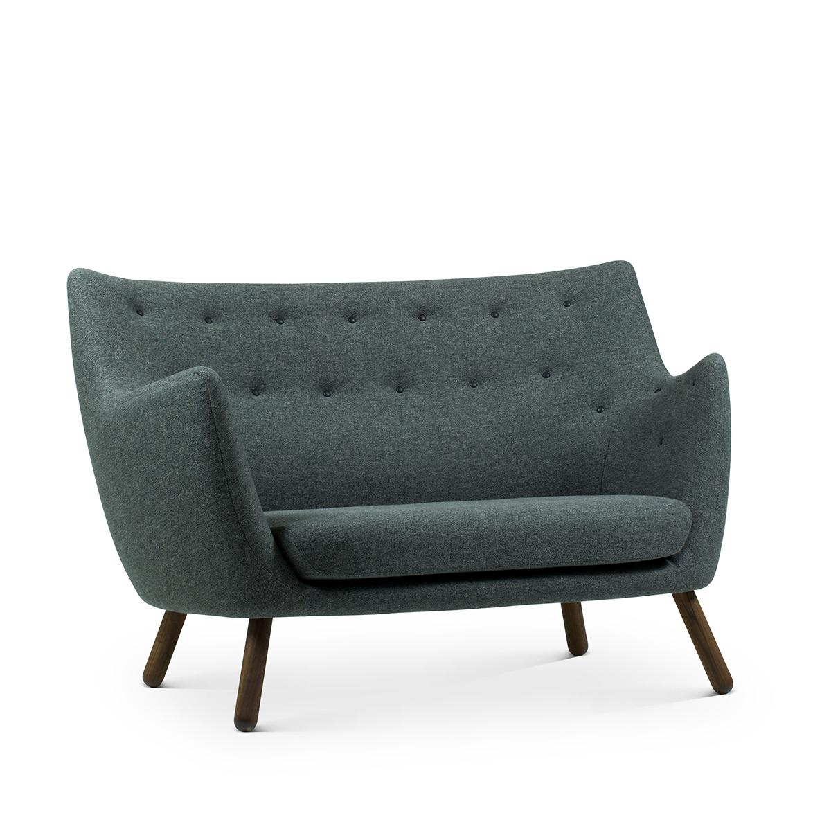 Sofa designed by Finn Juhl in 1946, relaunched in 2008.
Manufactured by House of Finn Juhl in Denmark.

This small two-seater sofa first saw the light of day at the Copenhagen Cabinetmakers’ Guild Exhibition in 1941. It should be seen as a
