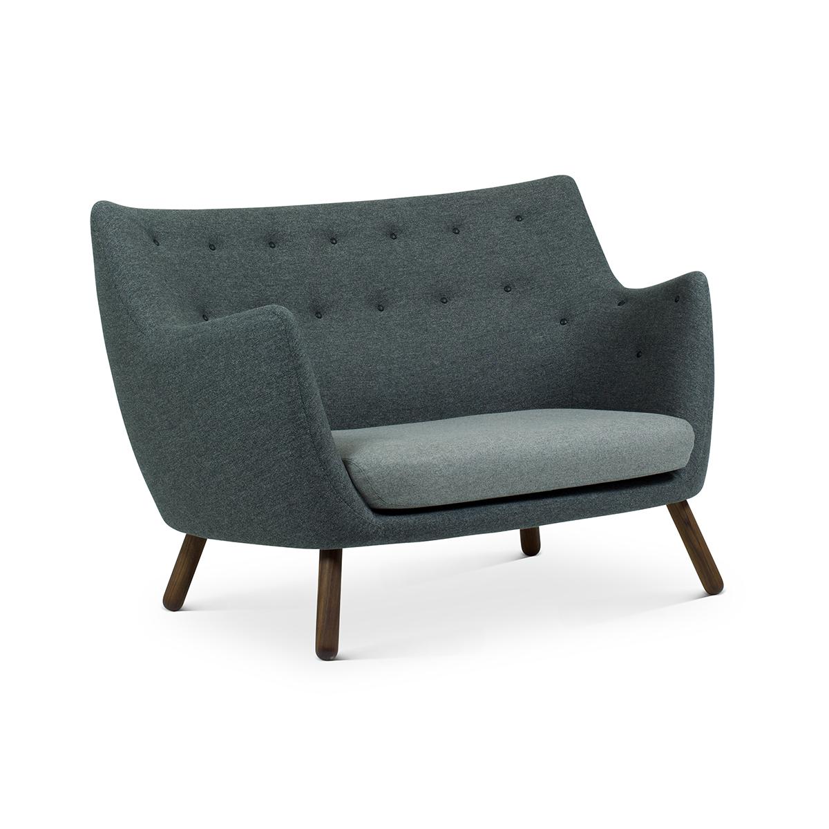 Sofa designed by Finn Juhl in 1946, relaunched in 2008.
Manufactured by House of Finn Juhl in Denmark.

This small two-seat sofa first saw the light of day at the Copenhagen Cabinetmakers’ Guild Exhibition in 1941. It should be seen as a natural